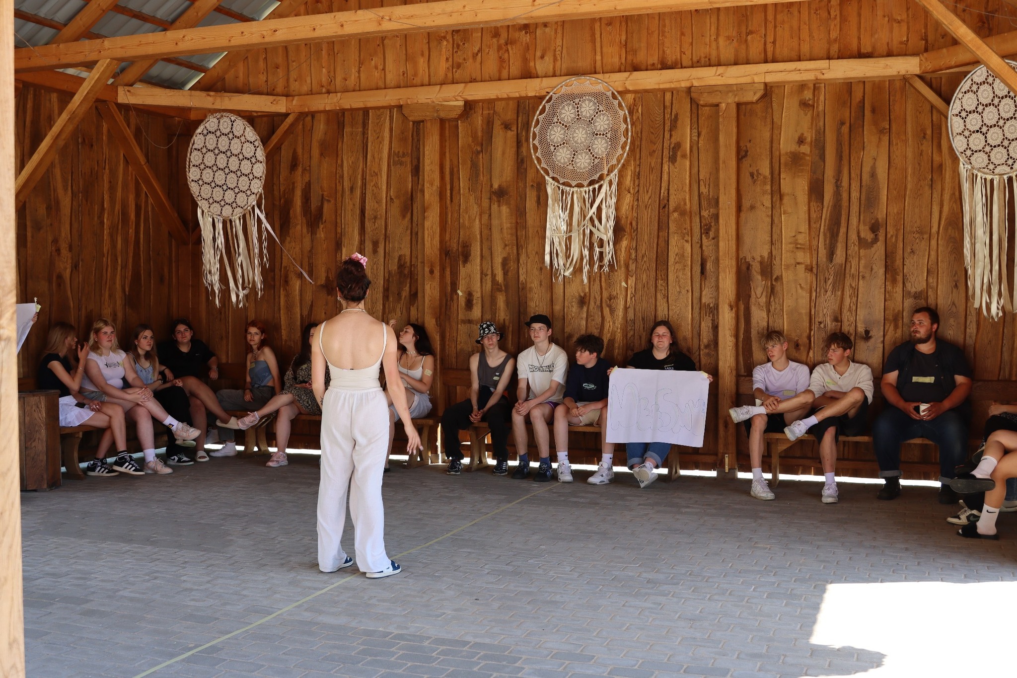 May be an image of 13 people and macrame