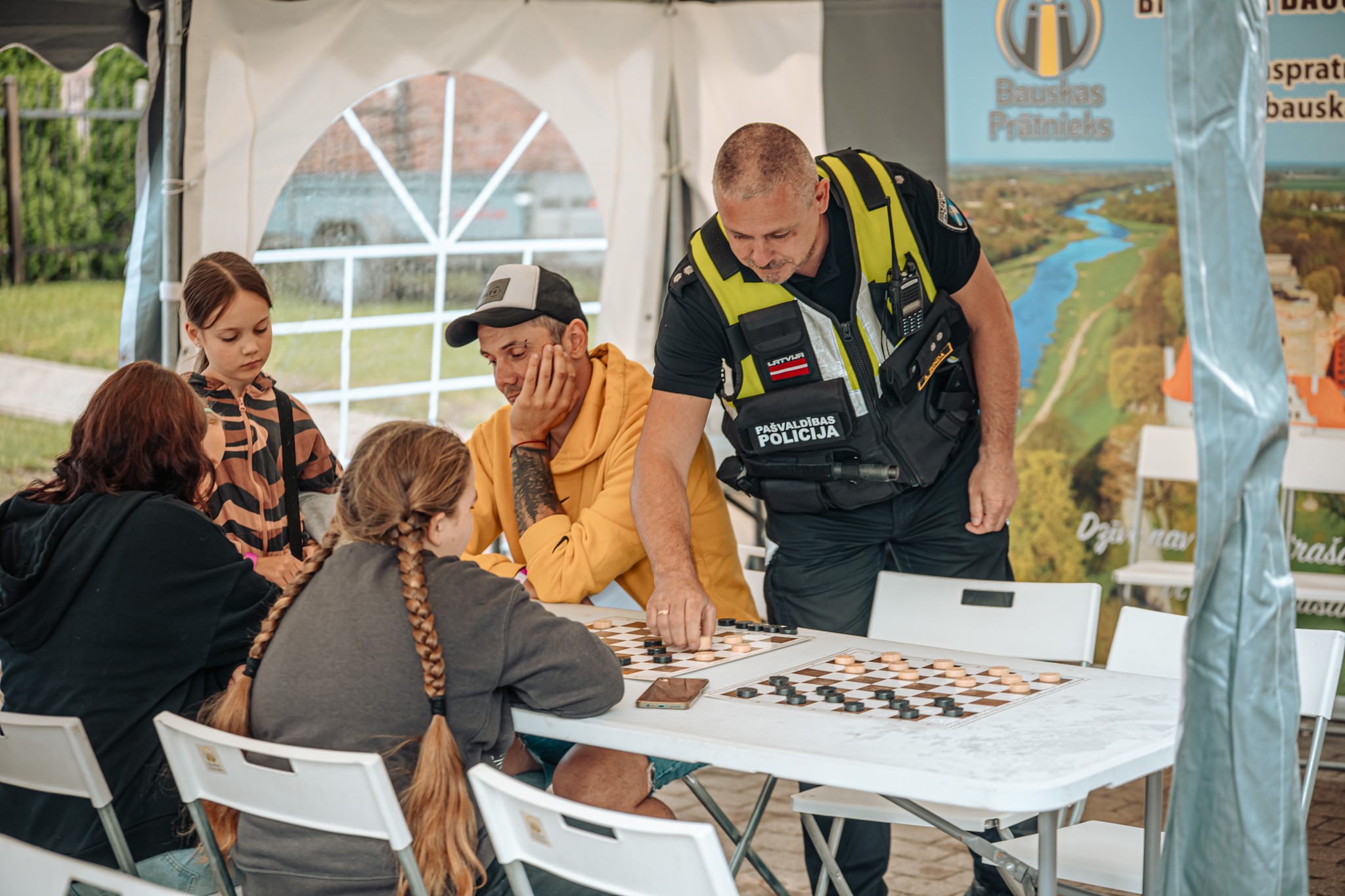 May be an image of 4 people and text that says 'N Bauskas Pratnieks isprat bausk UPEVUN 一 POLICIJA POLICIJA WALDH PASVALDIBAS Dgiiian ζαν Daii ras μлл!'