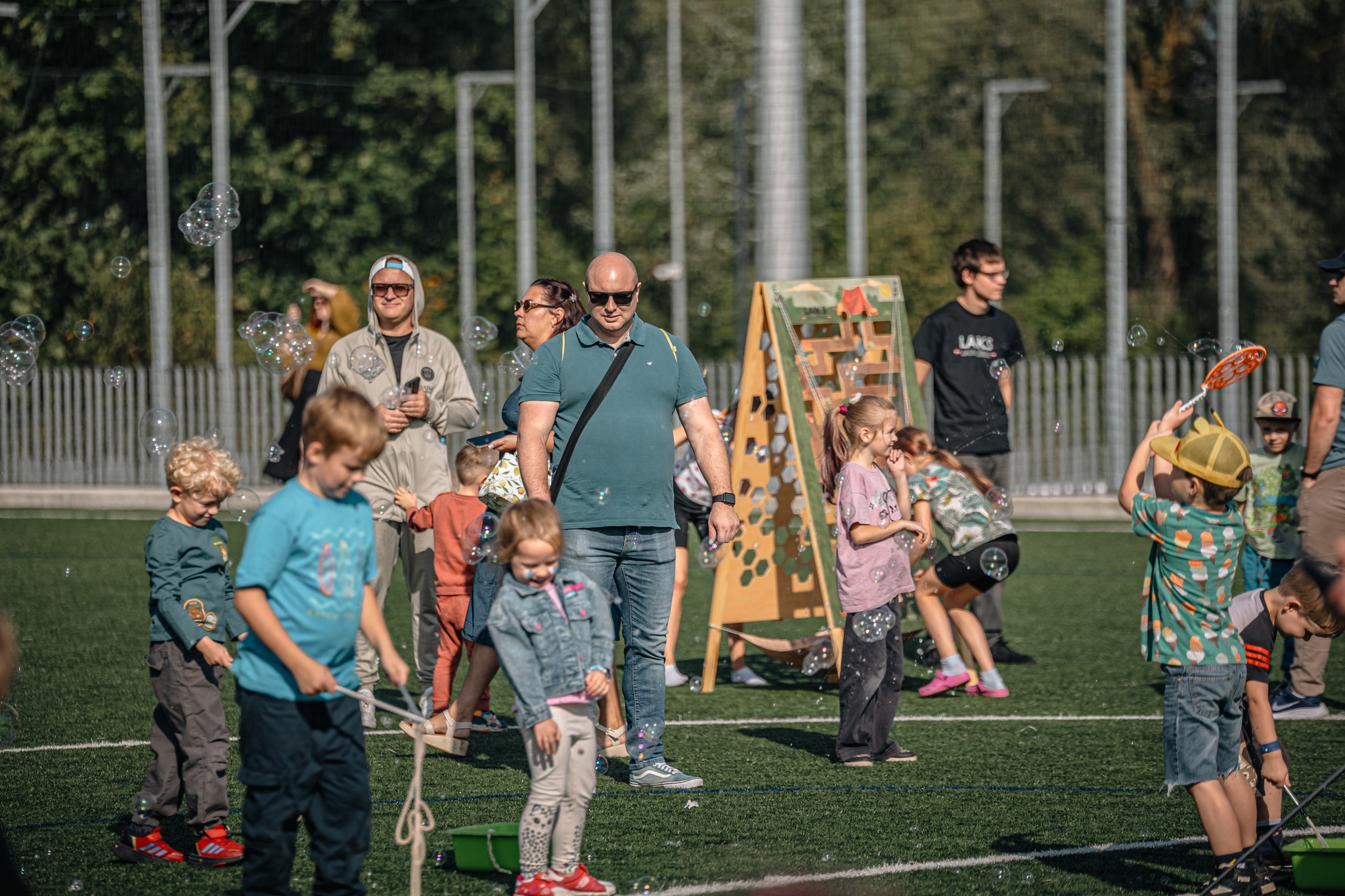 May be an image of 10 people, people playing soccer, people playing football and text that says 'LAKG "'
