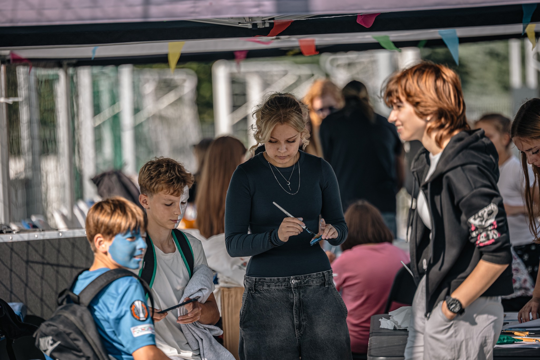 May be an image of 7 people and crowd