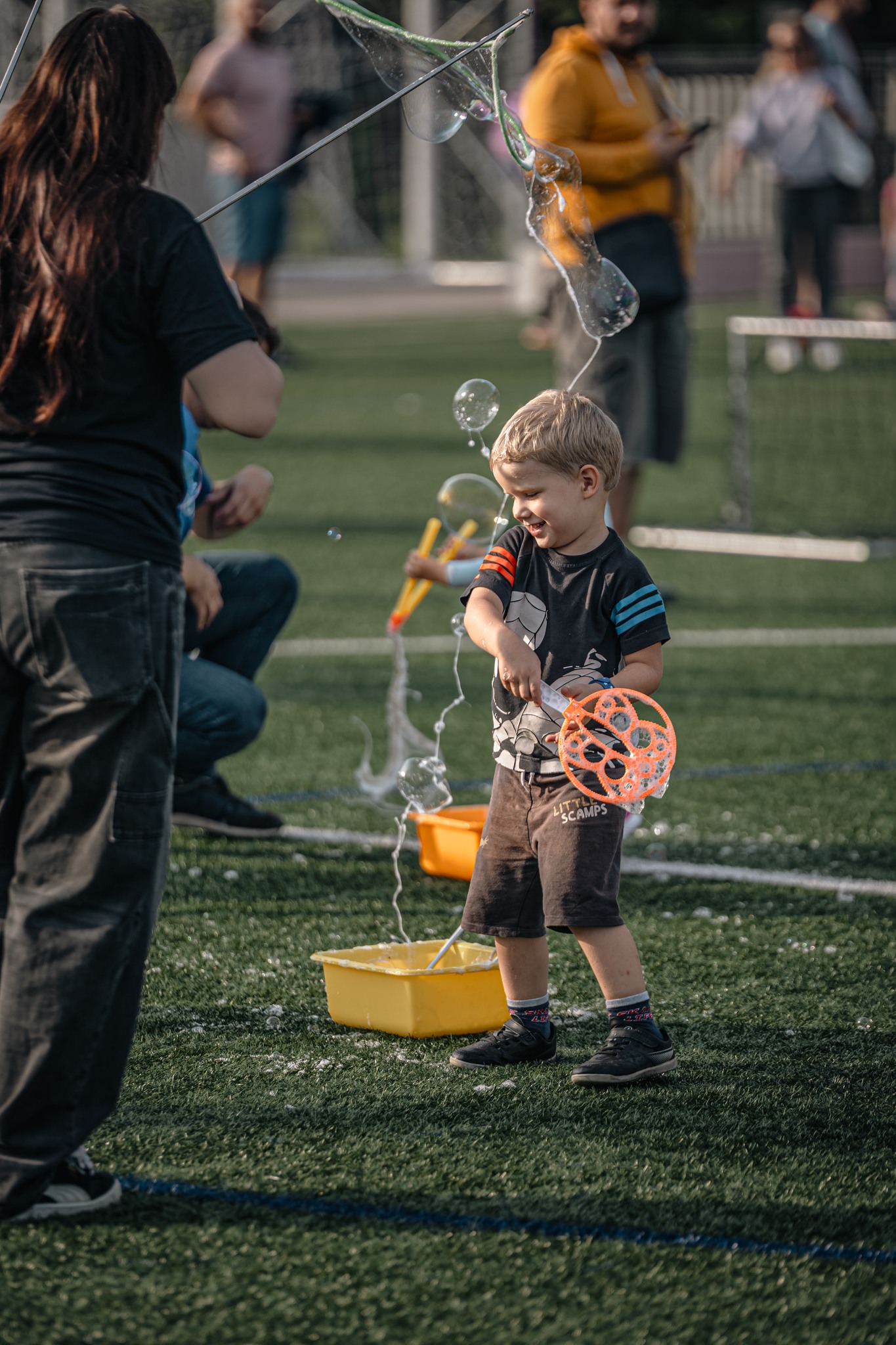 May be an image of 6 people, child and people playing soccer