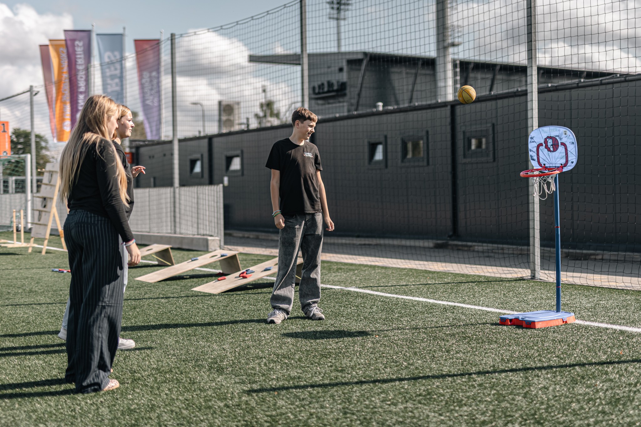 May be an image of 2 people, people playing soccer, people golfing and frisbee