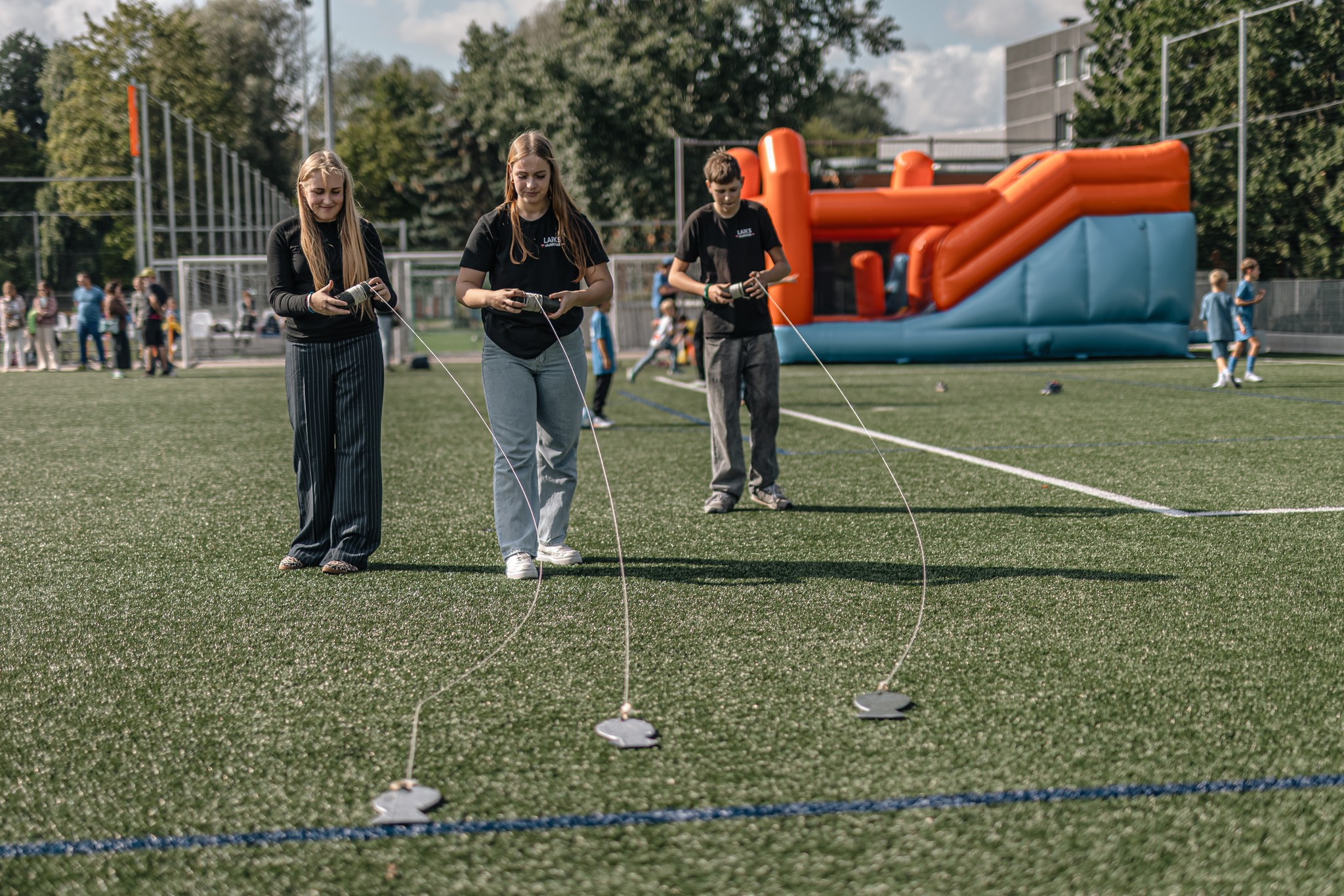 May be an image of 13 people, people golfing, frisbee and grass