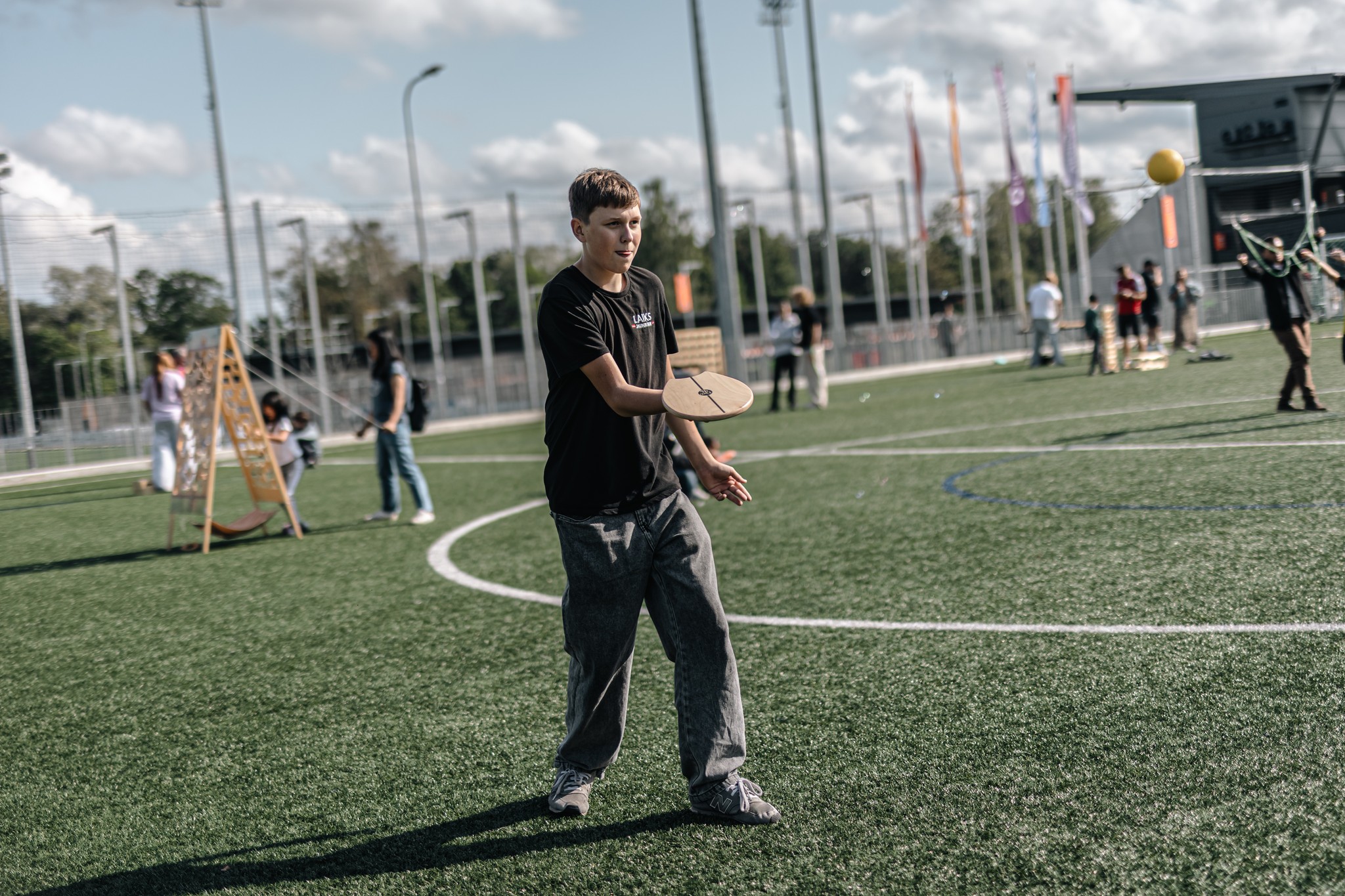 May be an image of 13 people, people playing soccer, people playing football, frisbee and grass