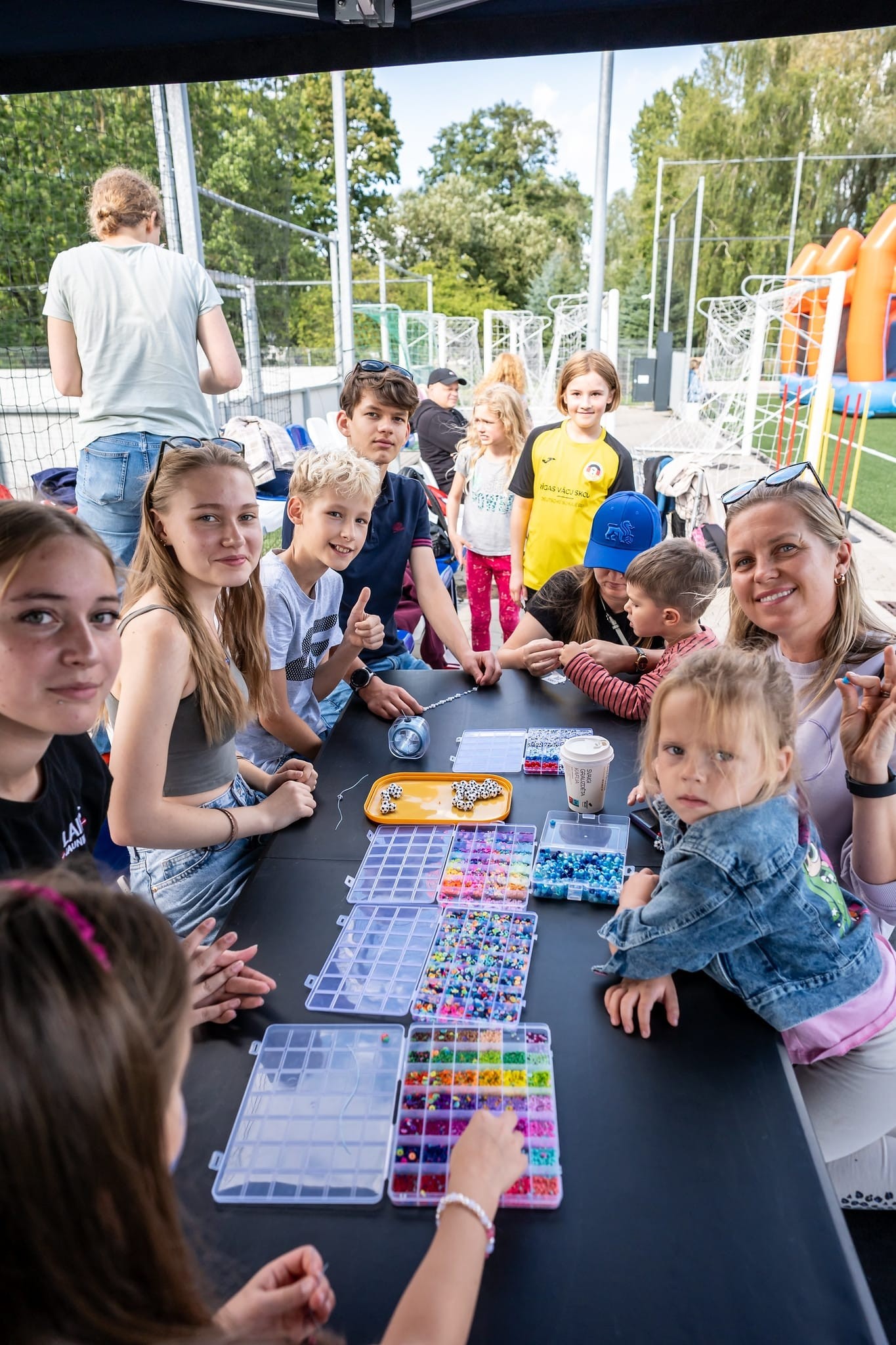 May be an image of 8 people, trampoline and text