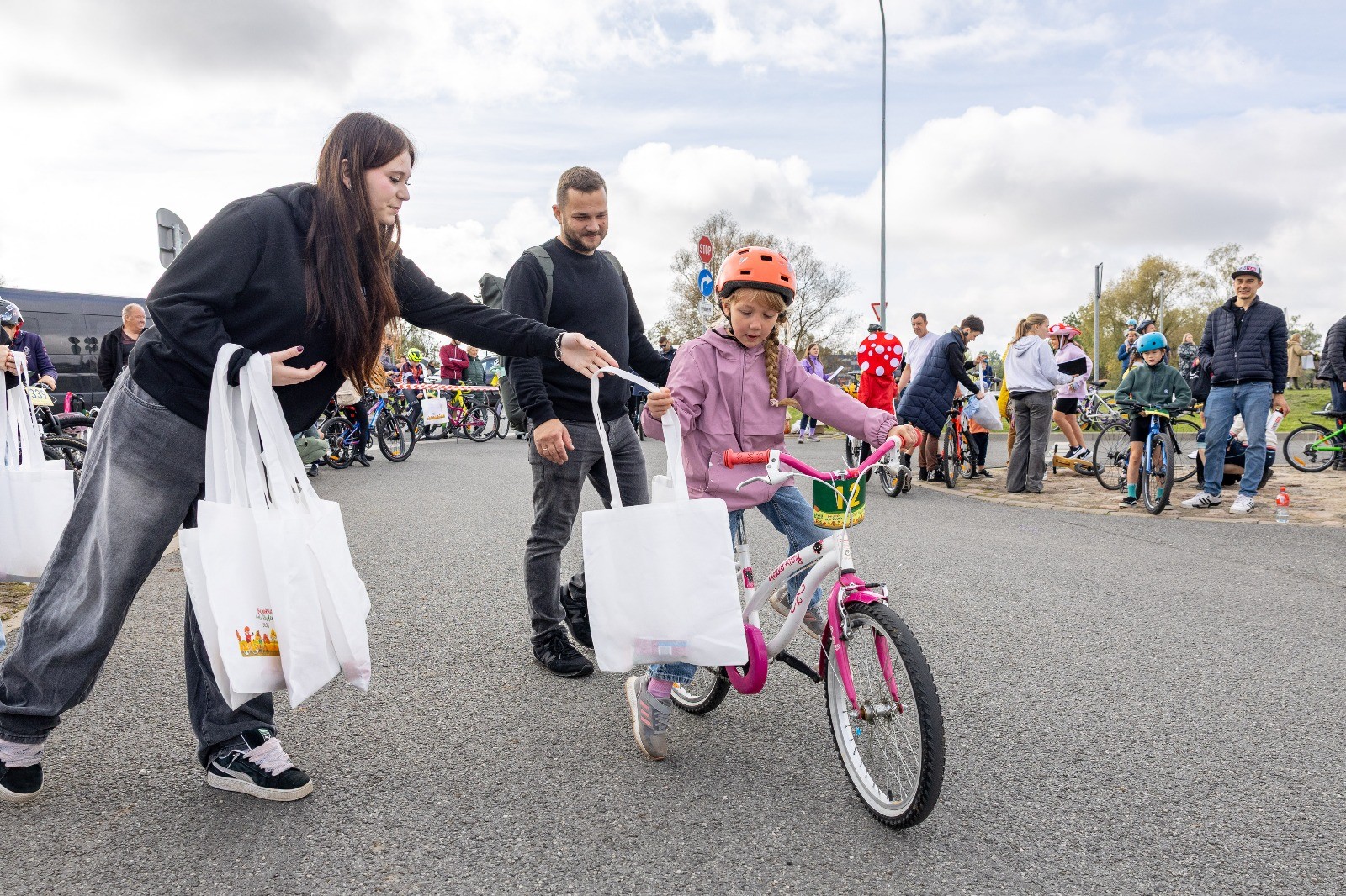 May be an image of 9 people, child, bicycle and scooter