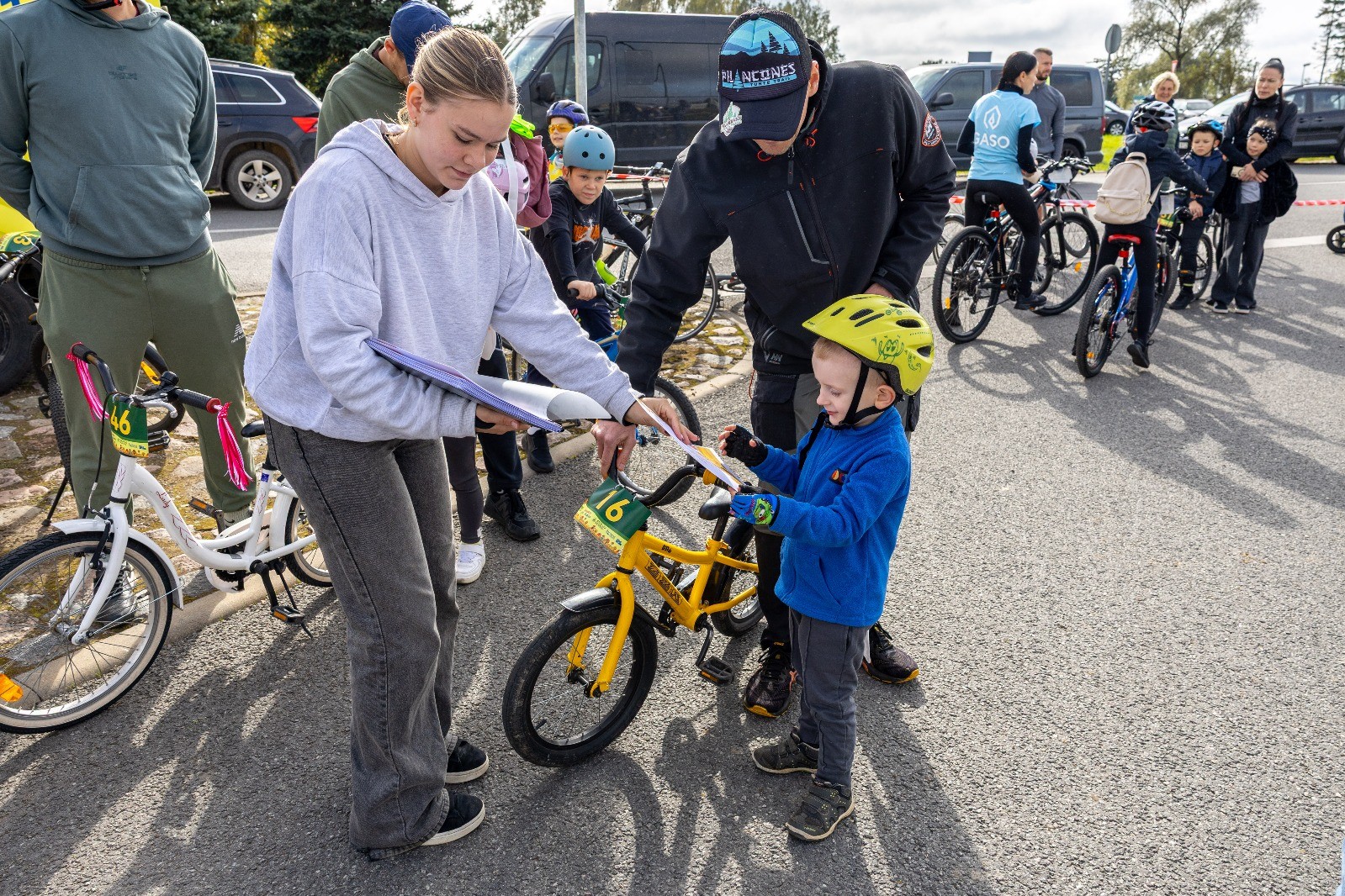 May be an image of 8 people, child, bicycle, motorcycle and scooter
