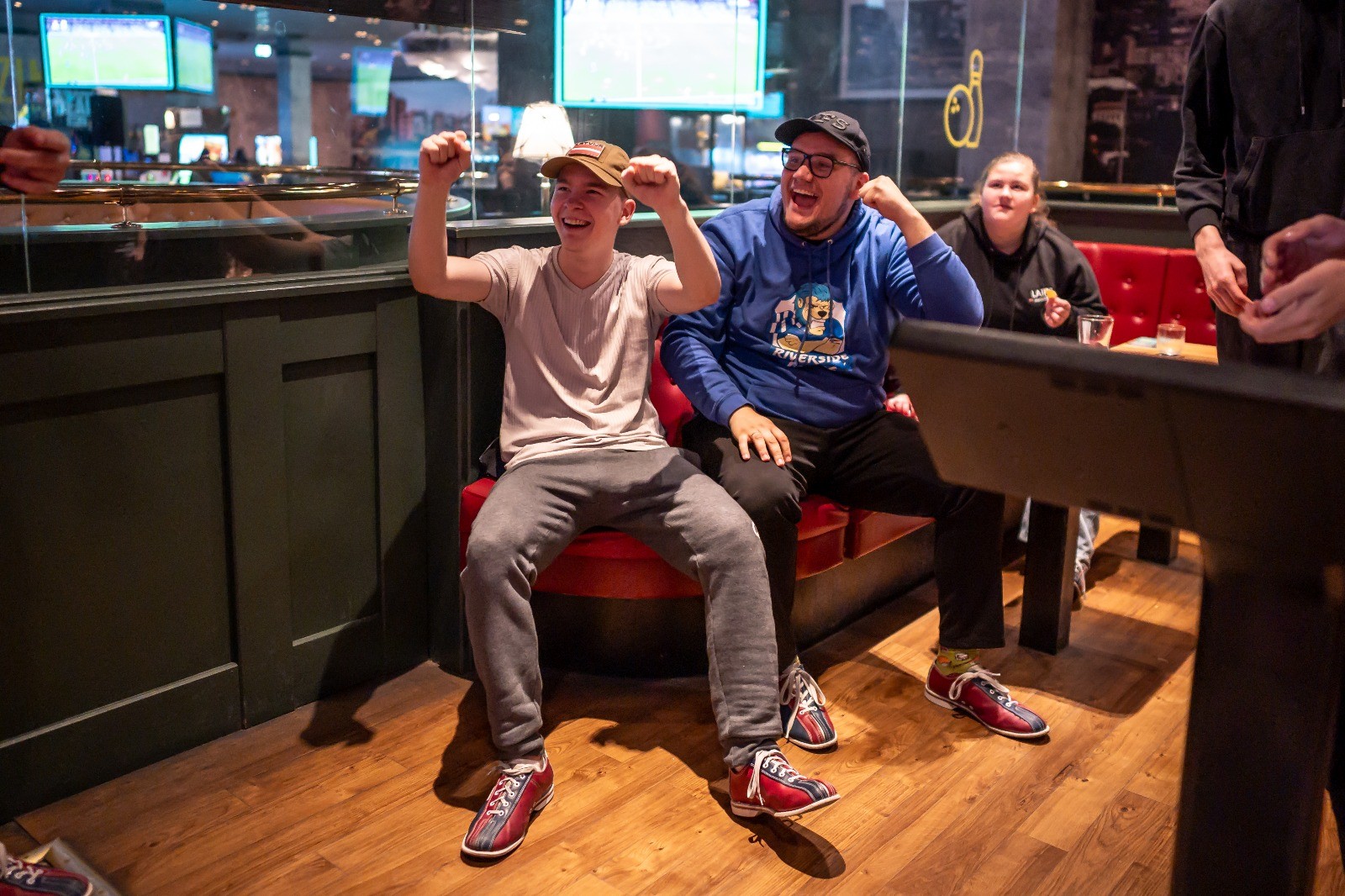 May be an image of one or more people and text