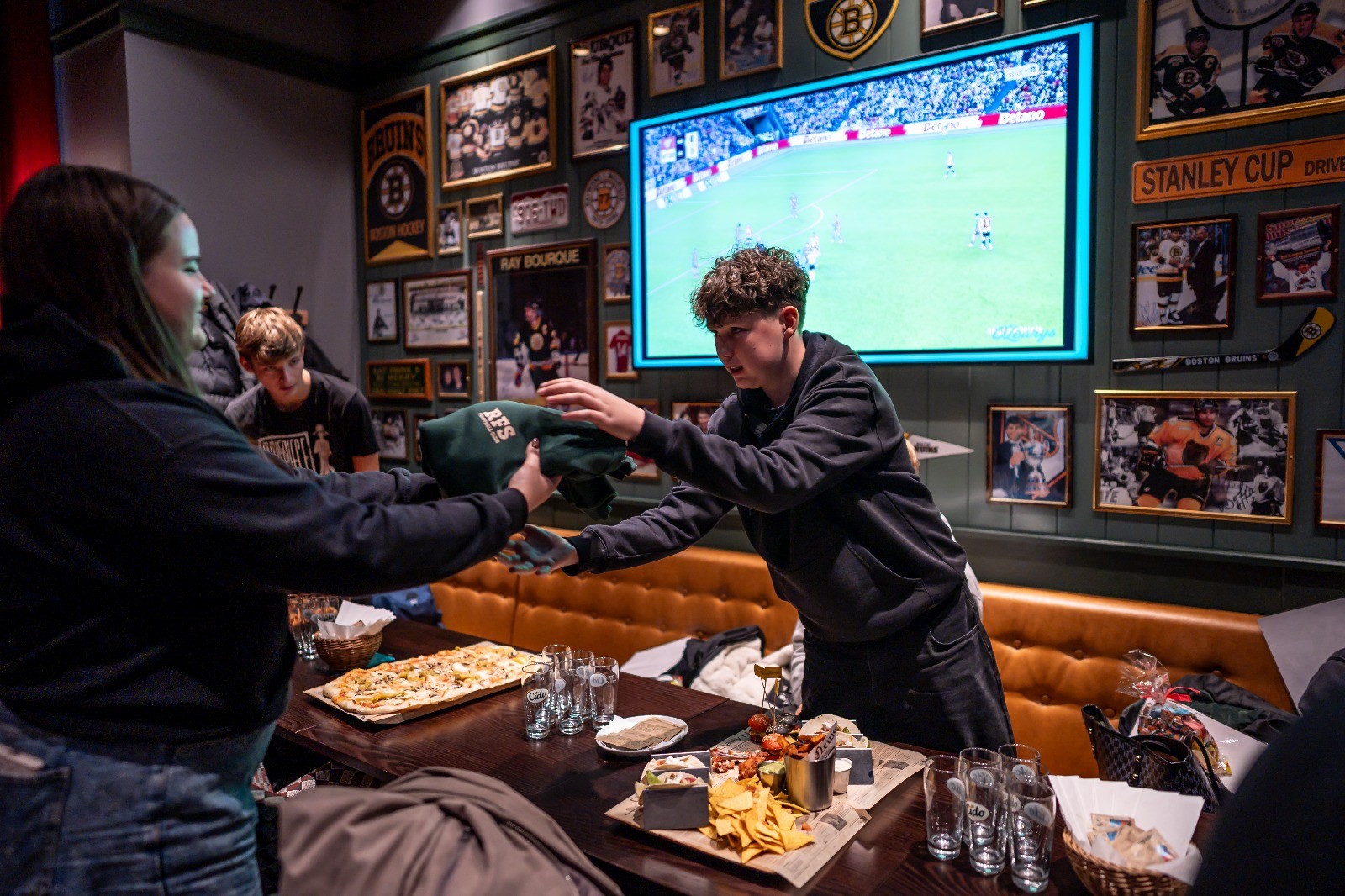 May be an image of football, soccer, dartboard and text