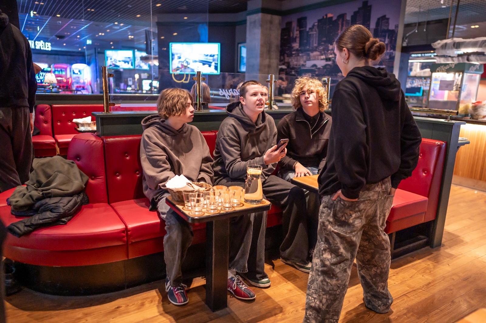 May be an image of one or more people, chess, table and text