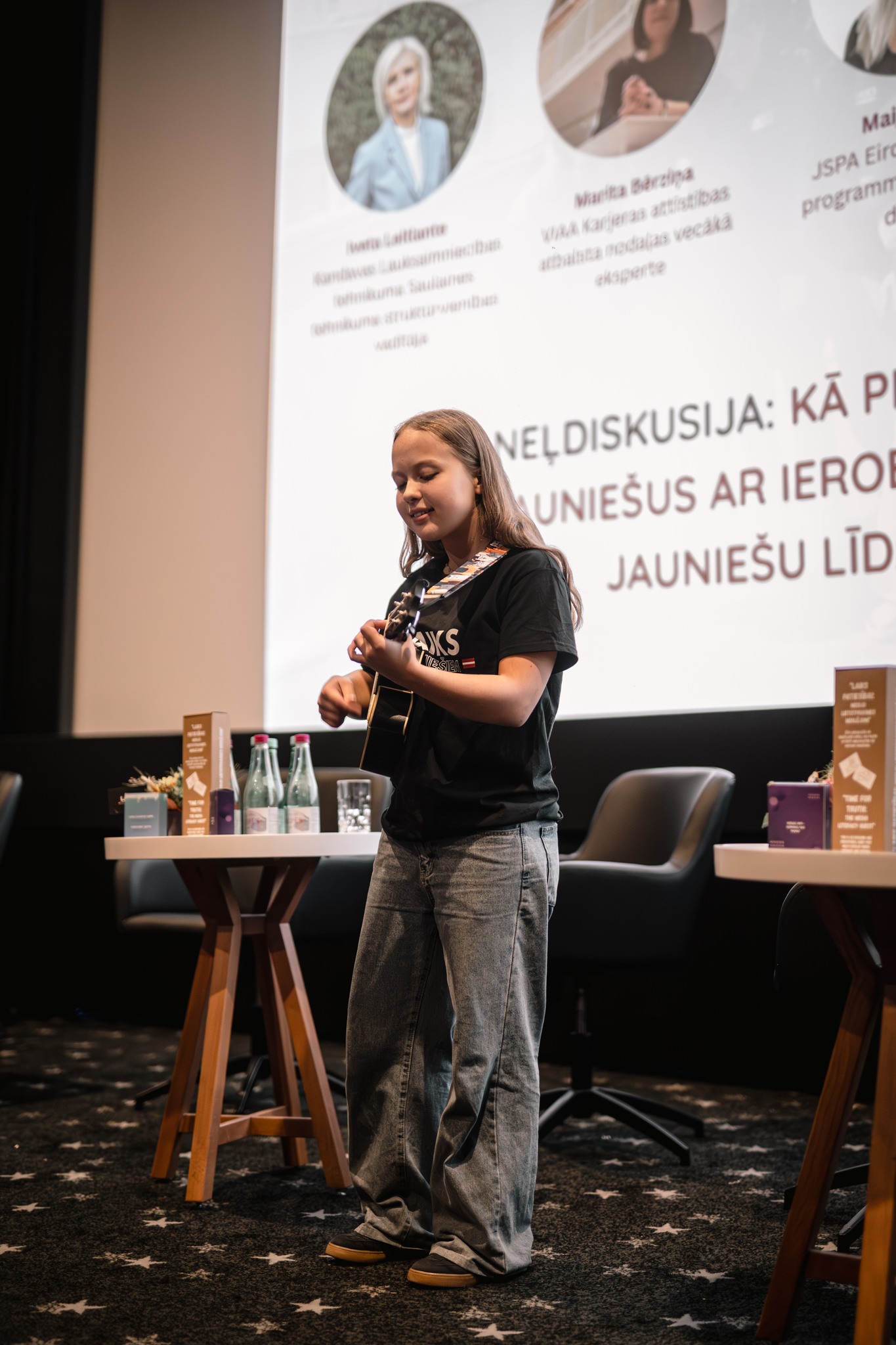 May be an image of 3 people and text