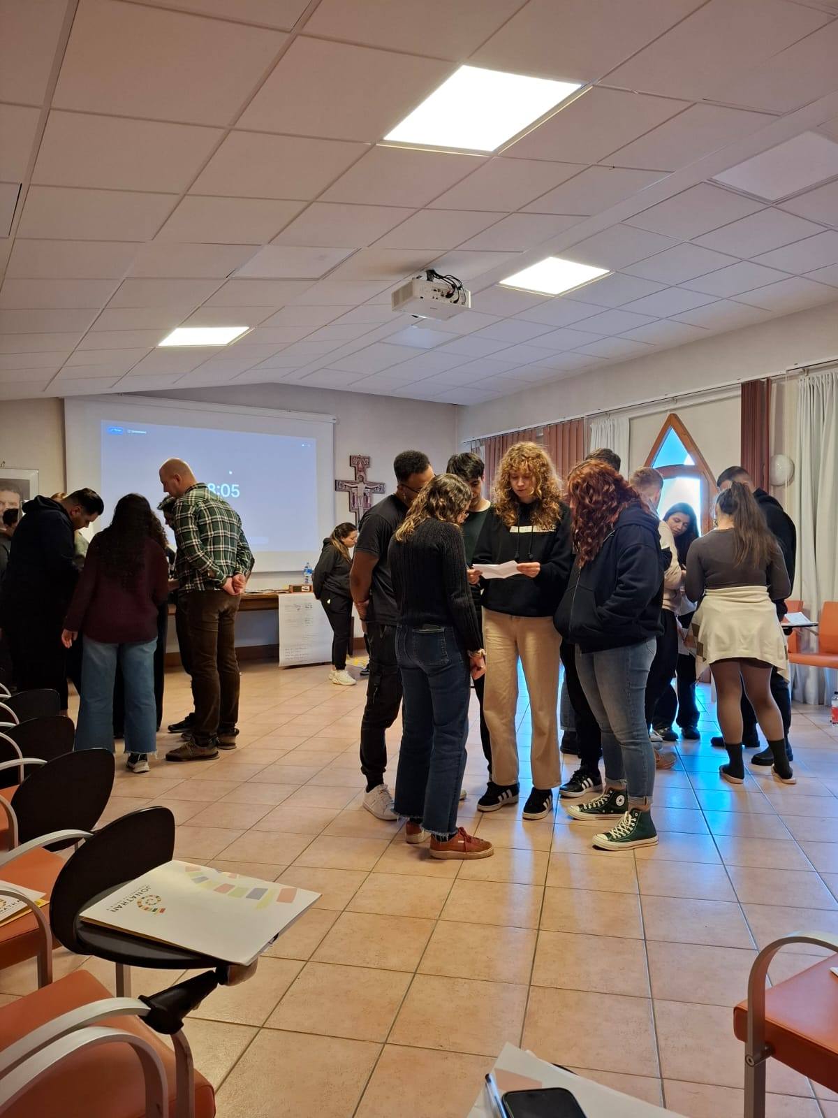 May be an image of studying and crowd