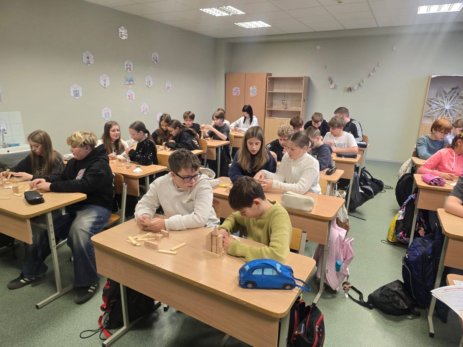 May be an image of studying and table