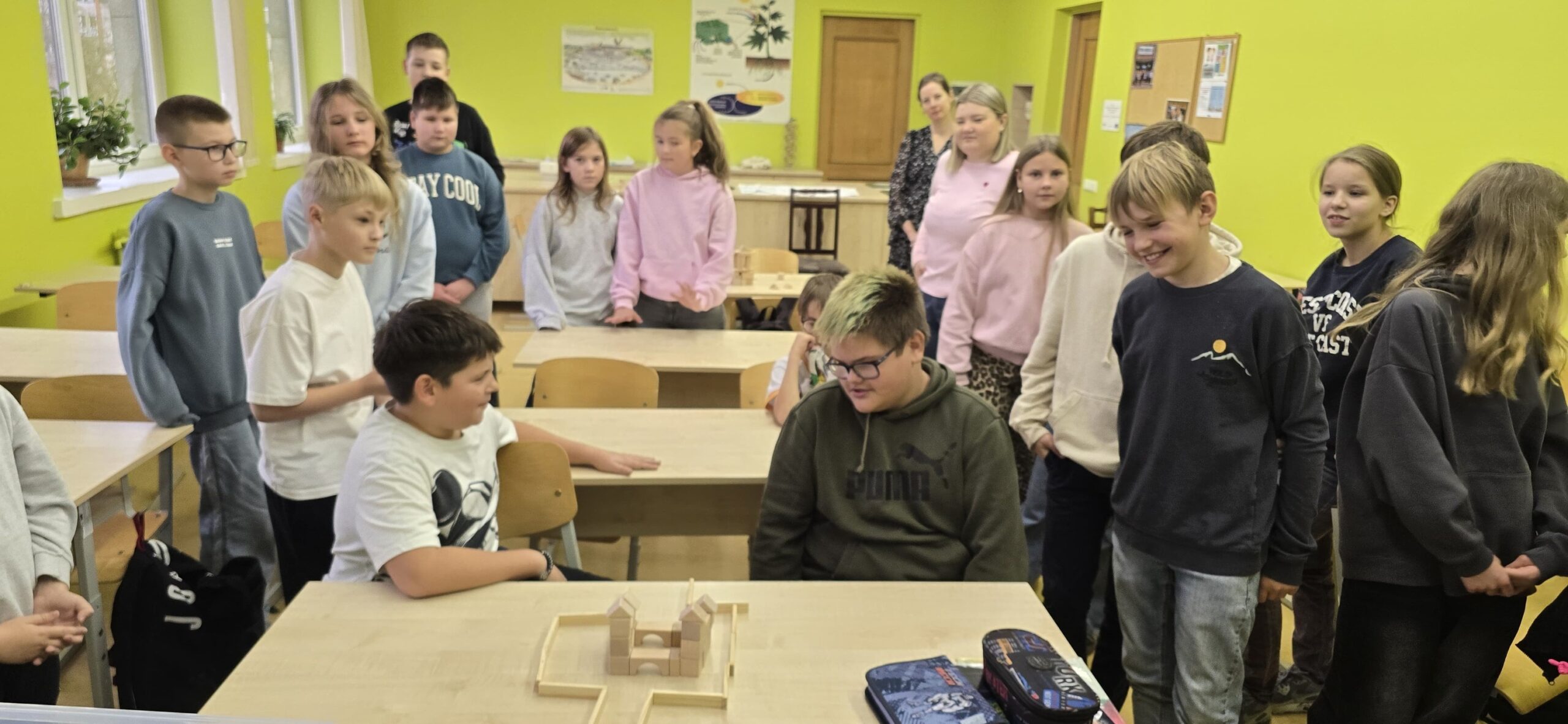 May be an image of studying and table