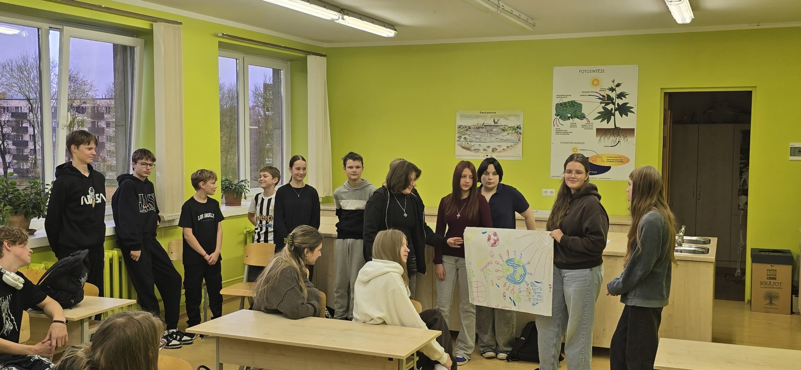 May be an image of studying and text