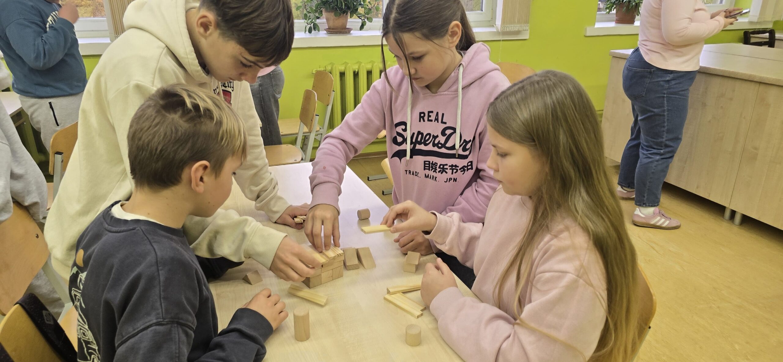 May be an image of studying and table