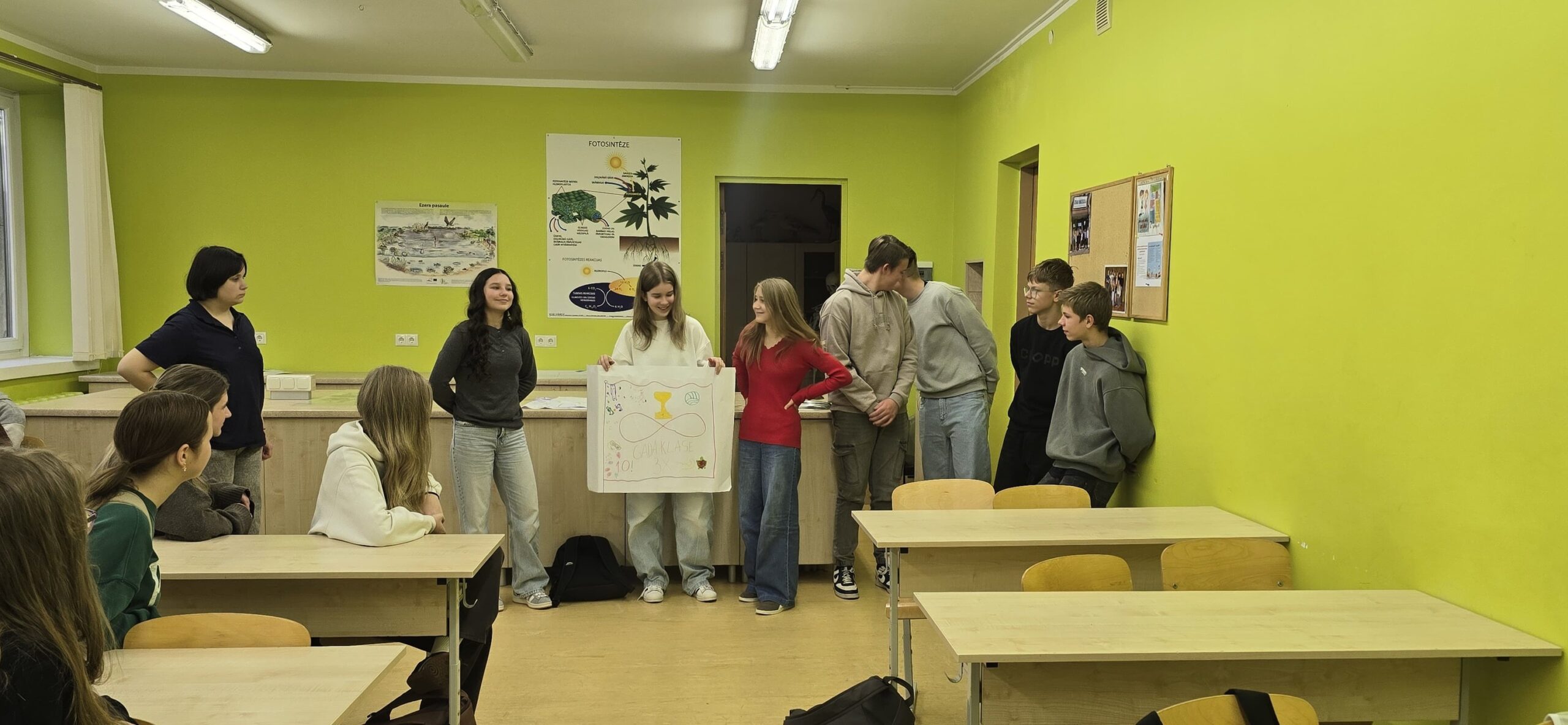 May be an image of studying, table and text