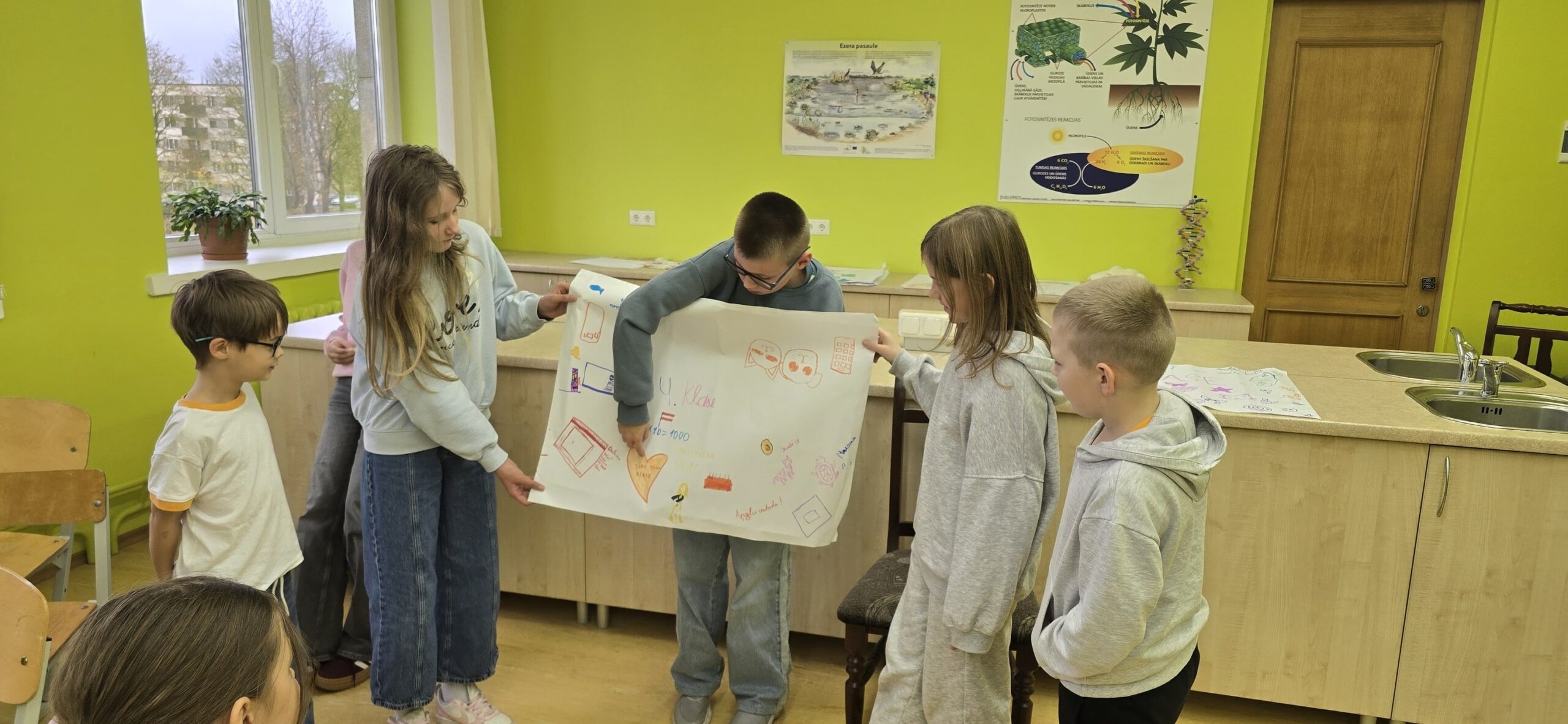 May be an image of child, studying and text