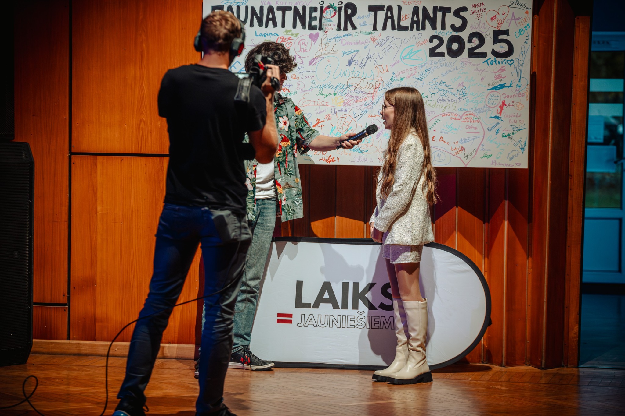 May be an image of one or more people and text