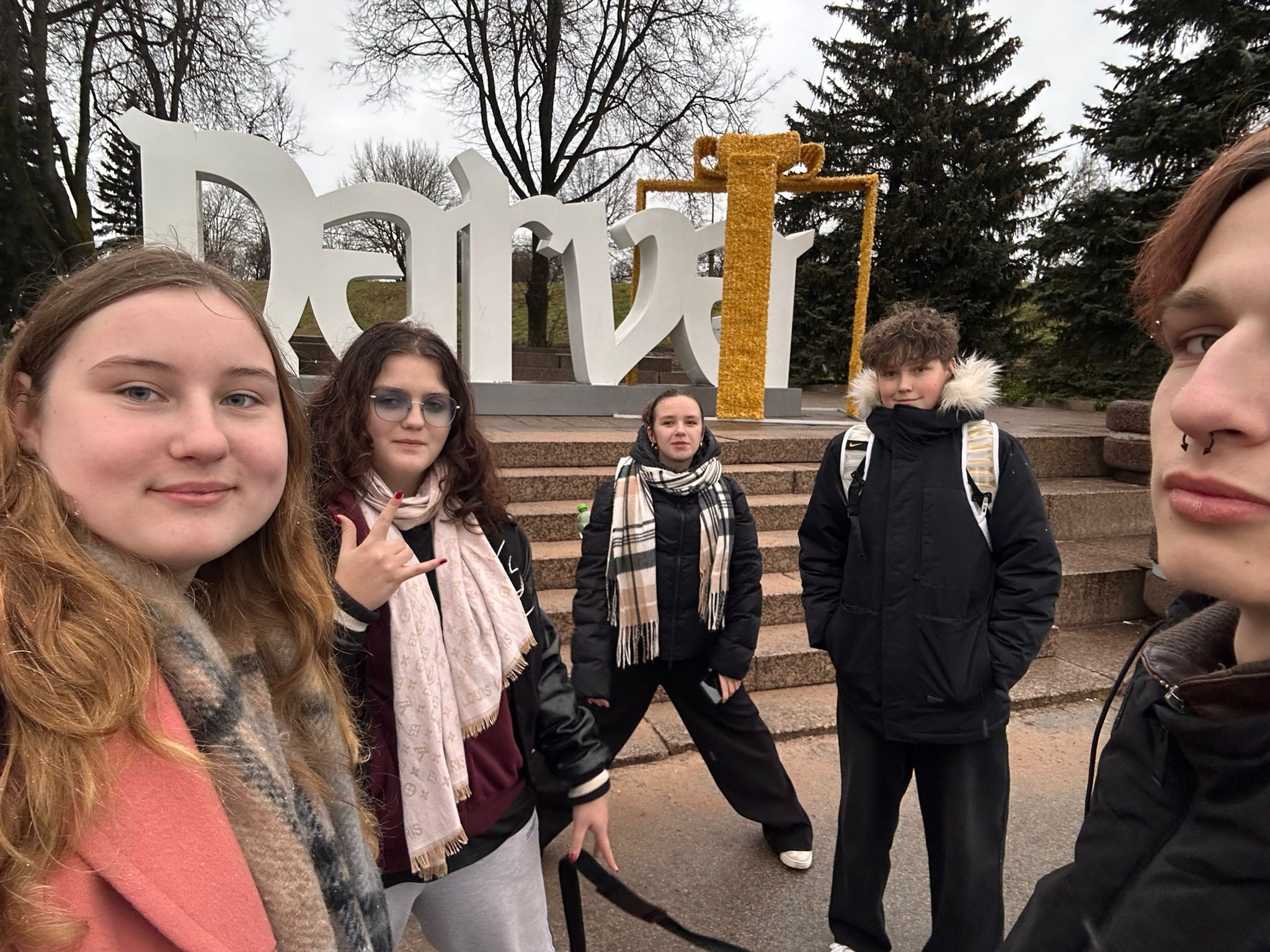 May be an image of one or more people, monument and text