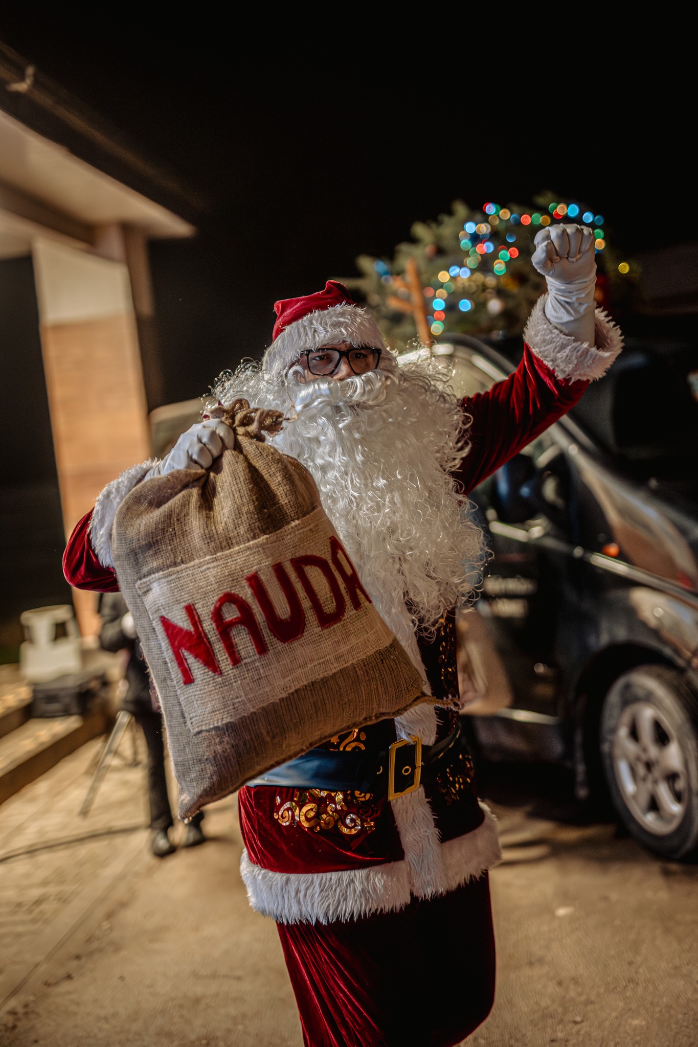 May be an image of christmas tree and street