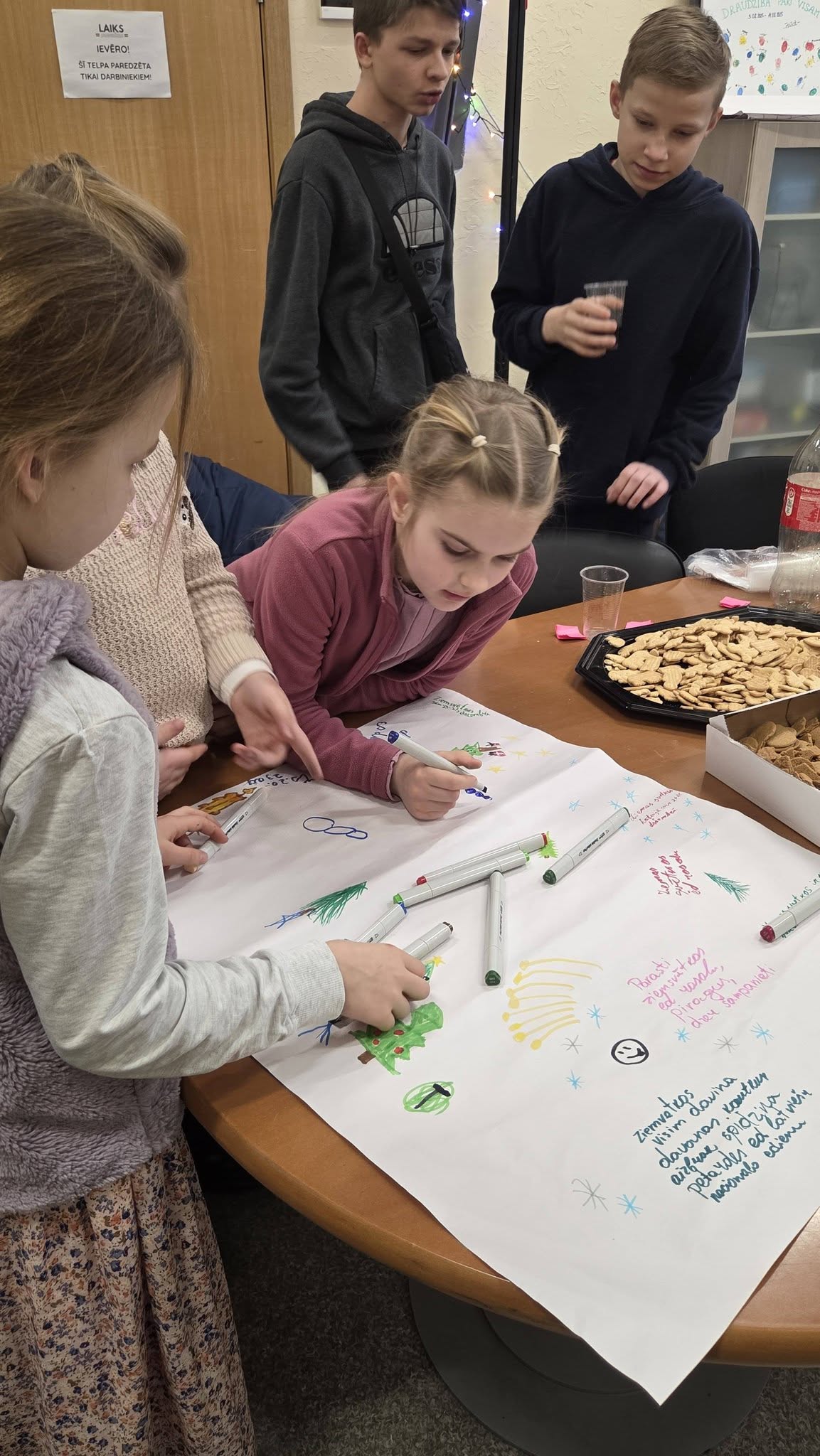 May be an image of studying and text