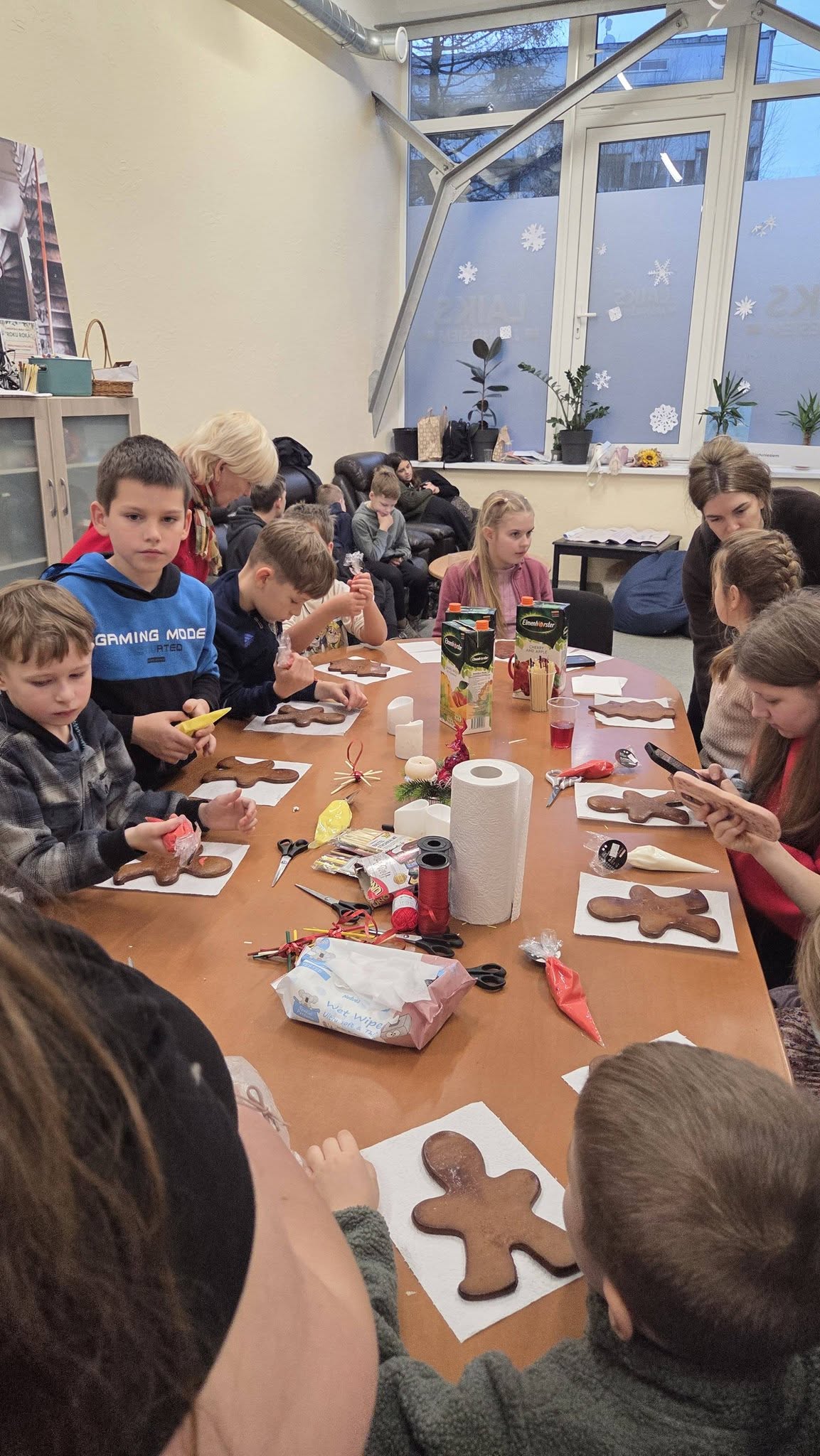 May be an image of gingerbread cookie and table