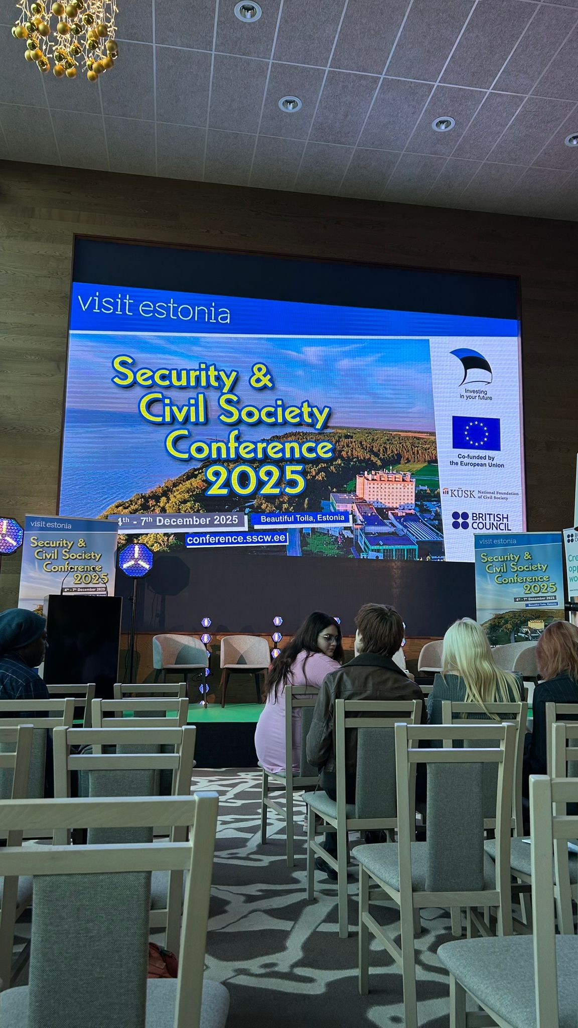 May be an image of ‎television and ‎text that says '‎visit visitestonia estonia Security & Civil Society Conference 2025 eoruin ម0. 7t December 2025 Esrepaas inion Visit citona Security Civils ociety Conference 2025 Confers انله Deautilu ola.Estonia "KUSK.ersiom ستاس conference.sscw.0e BRITISH COUNOIL : Civil Society Conternce سسمی‎'‎‎