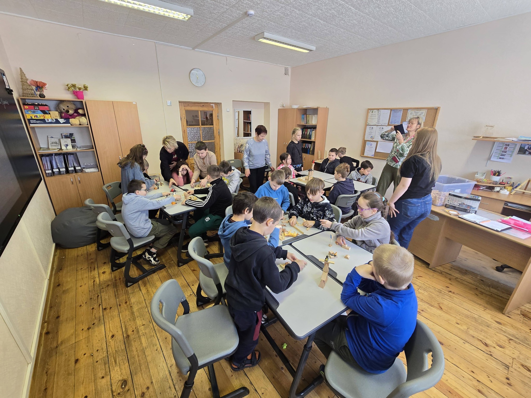 May be an image of studying and table