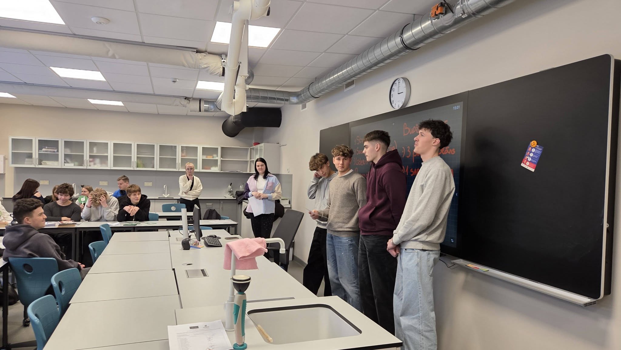 May be an image of studying and text