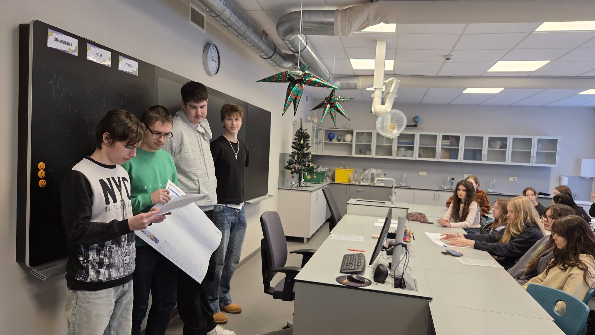 May be an image of studying and text