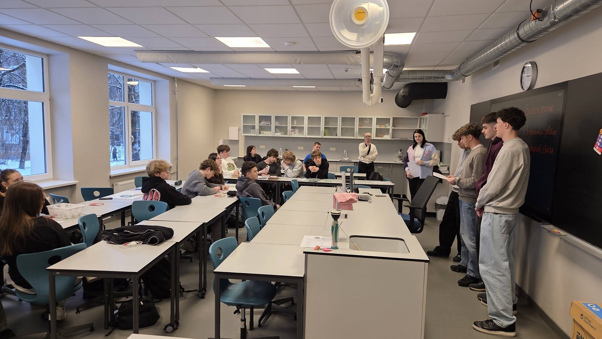 May be an image of studying and table