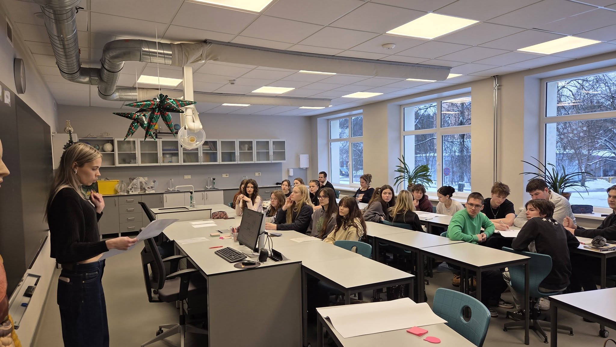 May be an image of studying and table