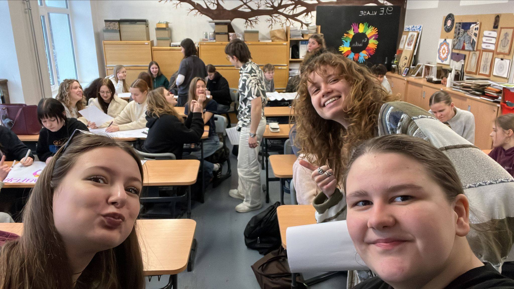 May be an image of studying and table