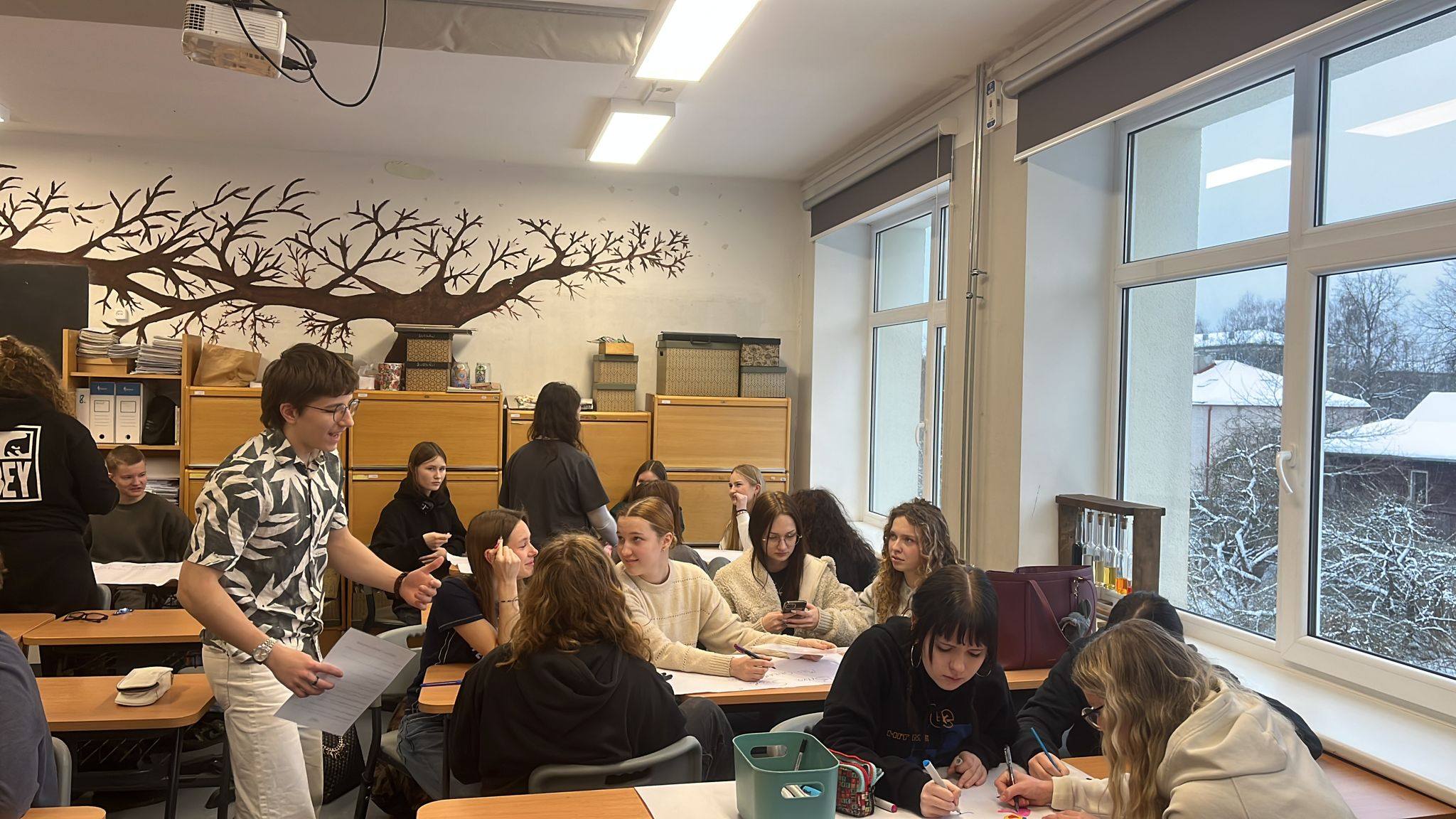 May be an image of studying and table