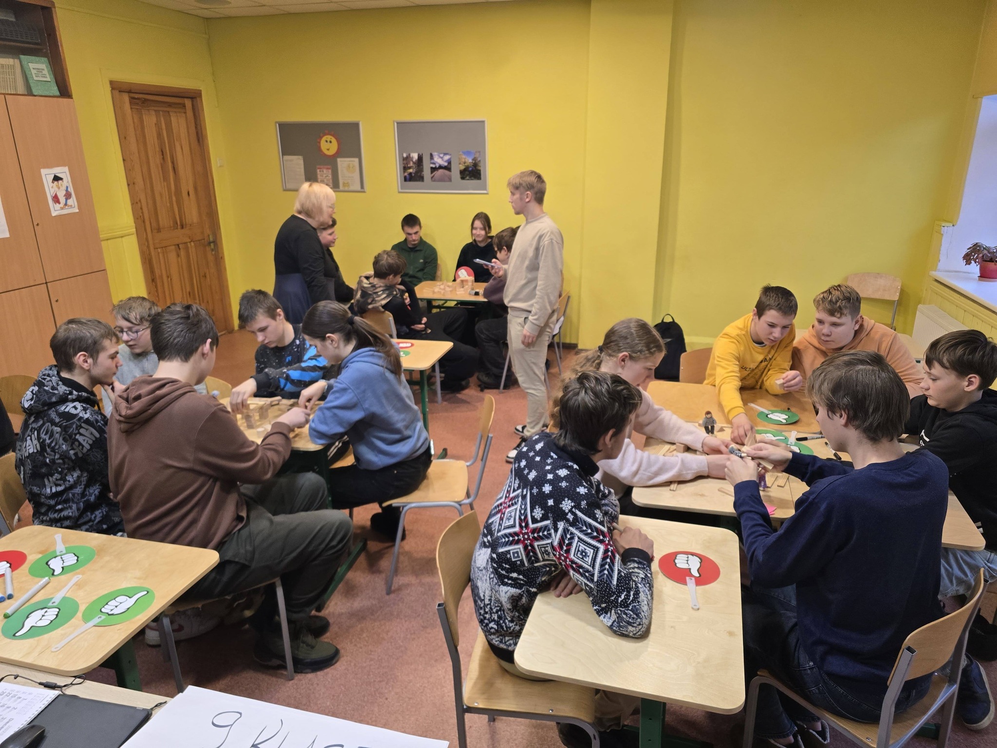 May be an image of studying and table