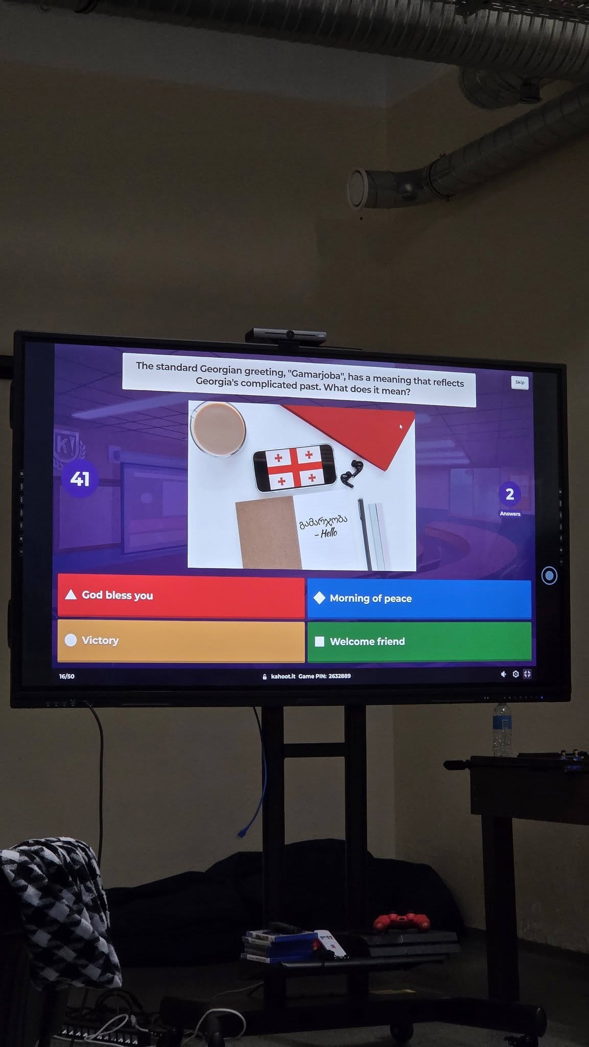 May be an image of television, controller and text