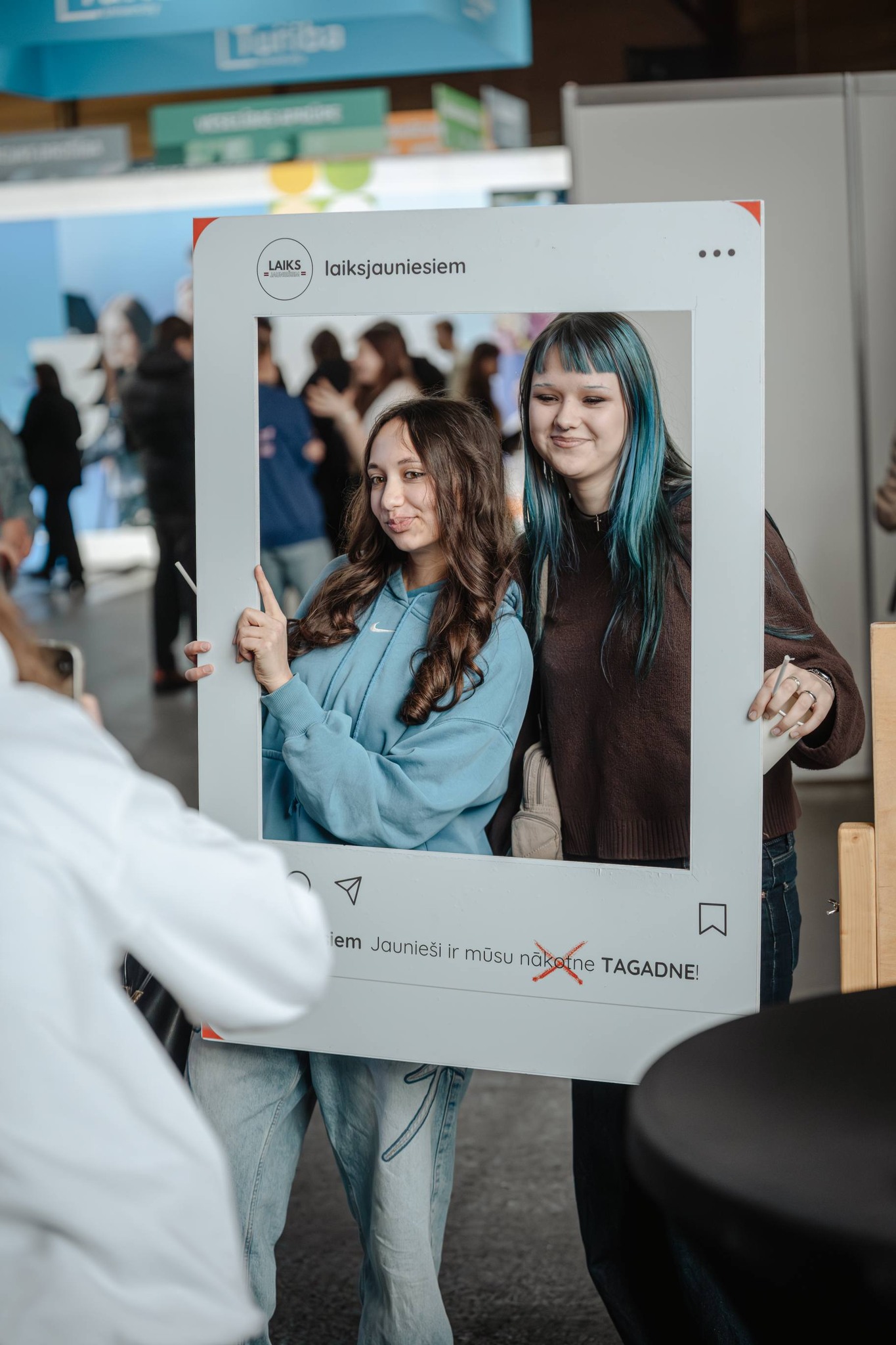 May be an image of one or more people, people smiling and text