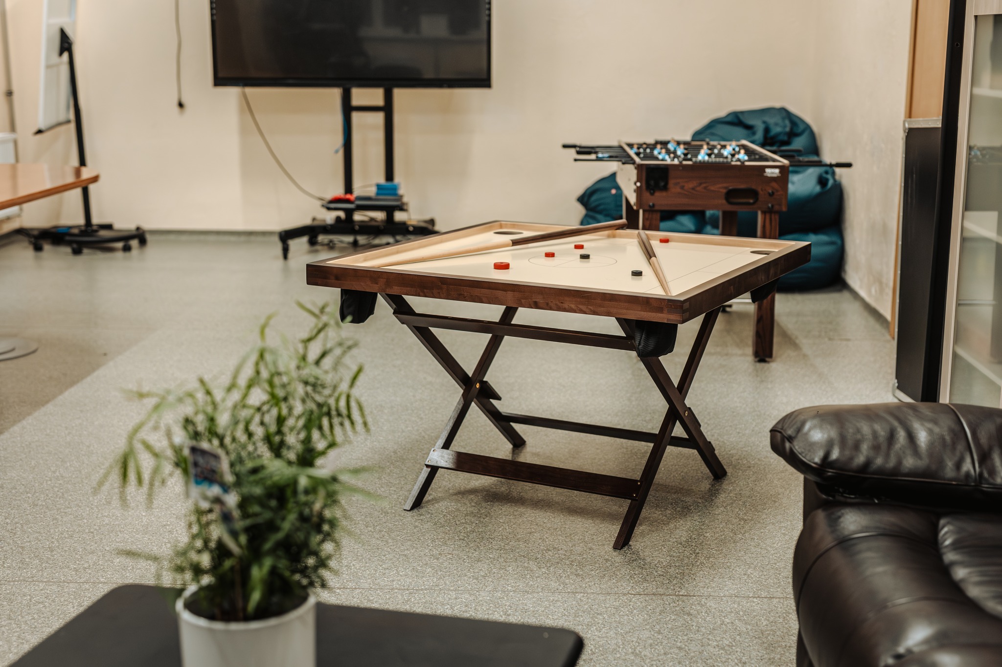 May be an image of dartboard, table and indoors