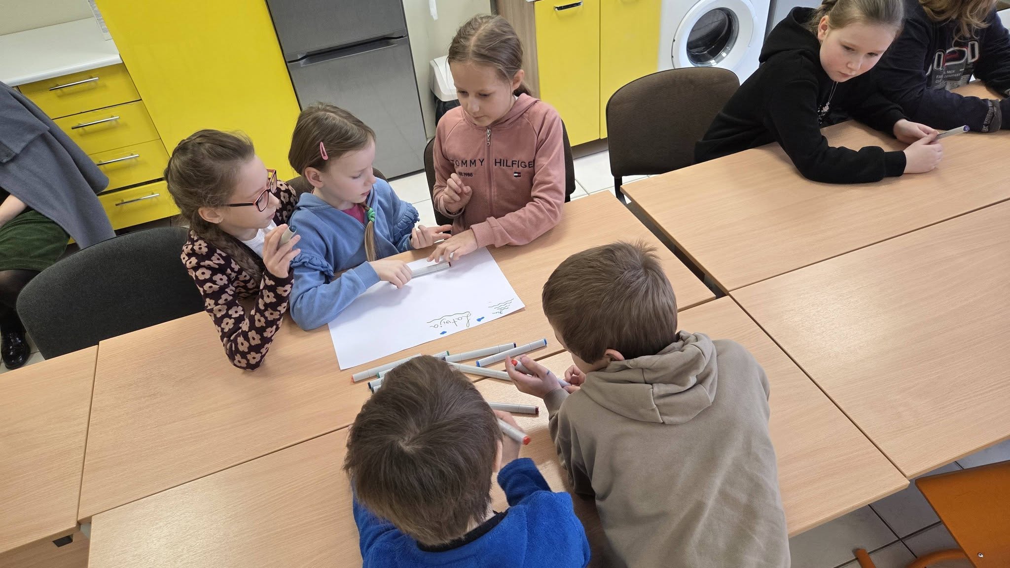 May be an image of studying