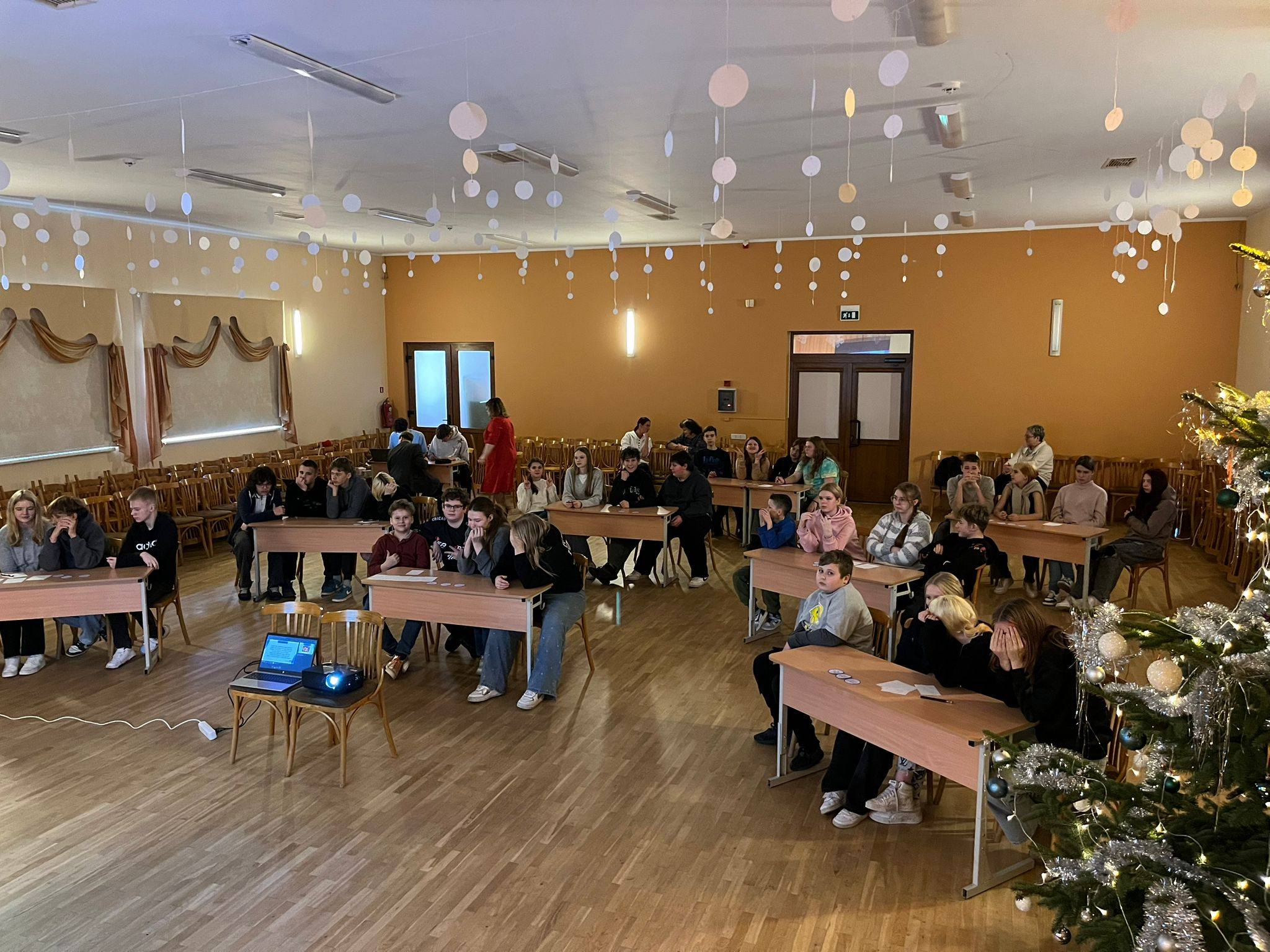 May be an image of christmas tree, table and lighting