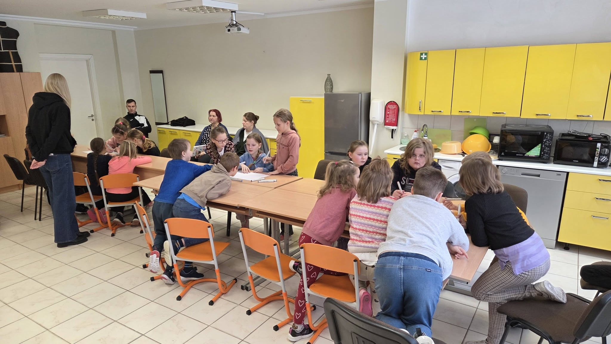 May be an image of studying and table