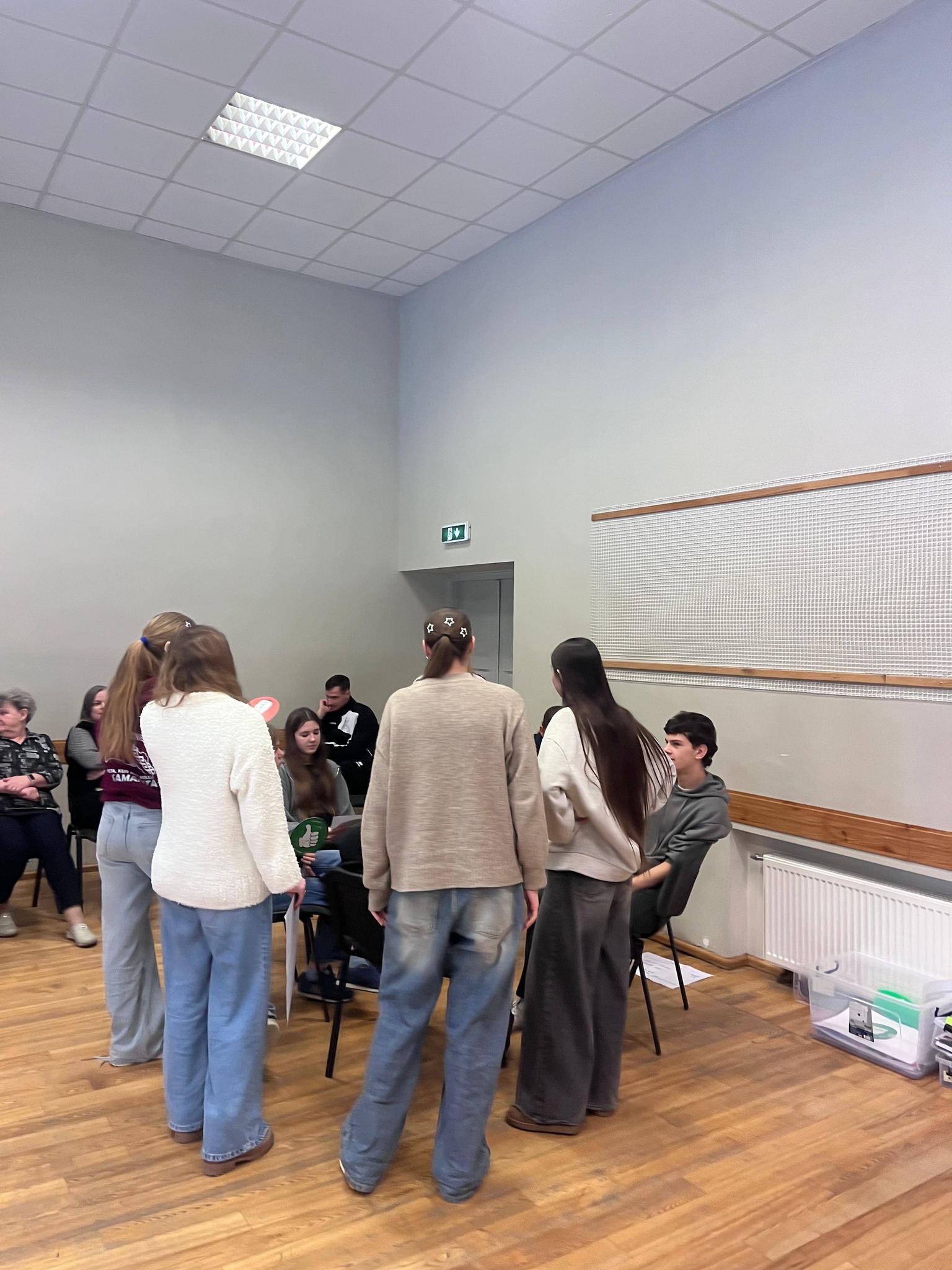 May be an image of studying and crowd