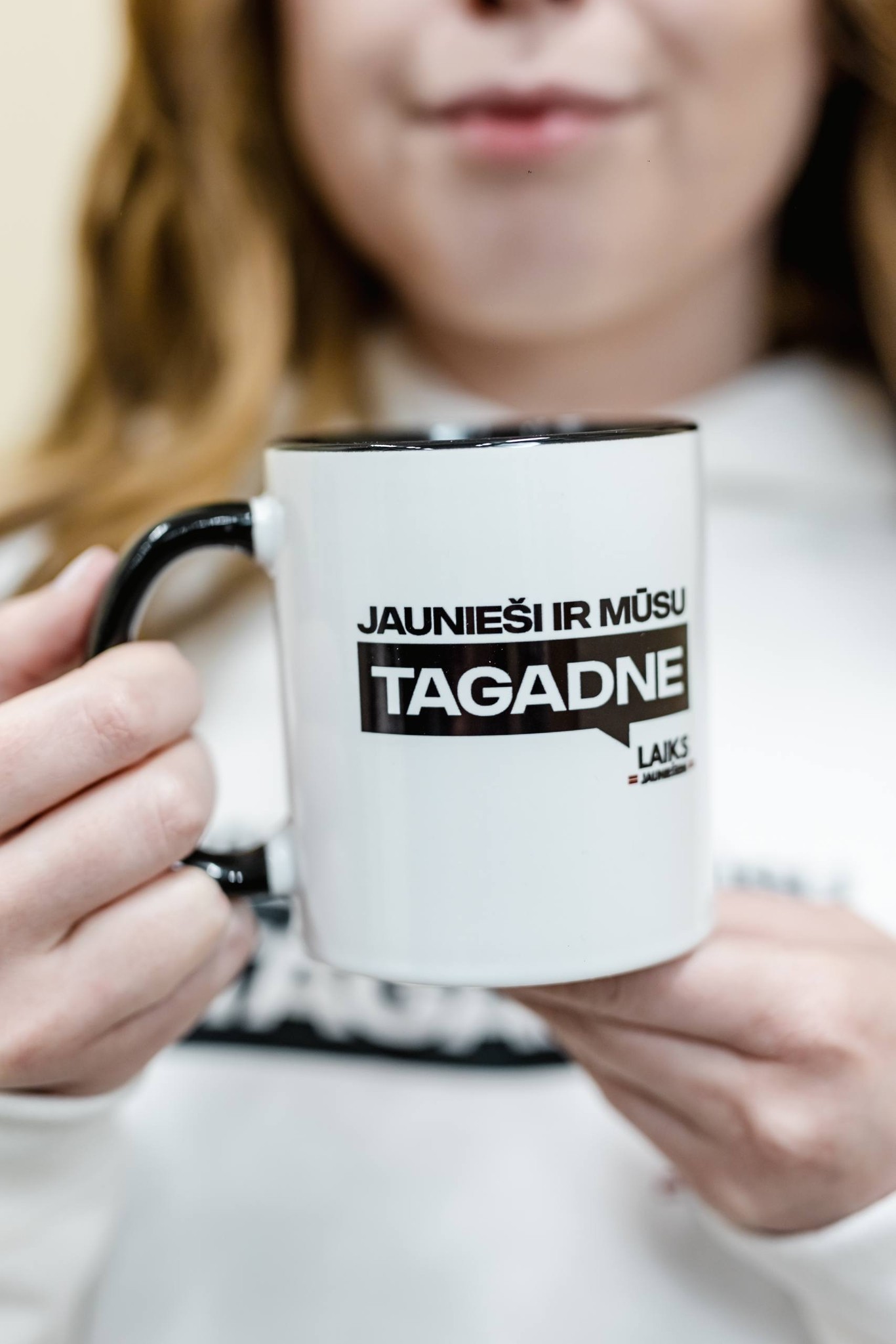 May be an image of coffee cup and text