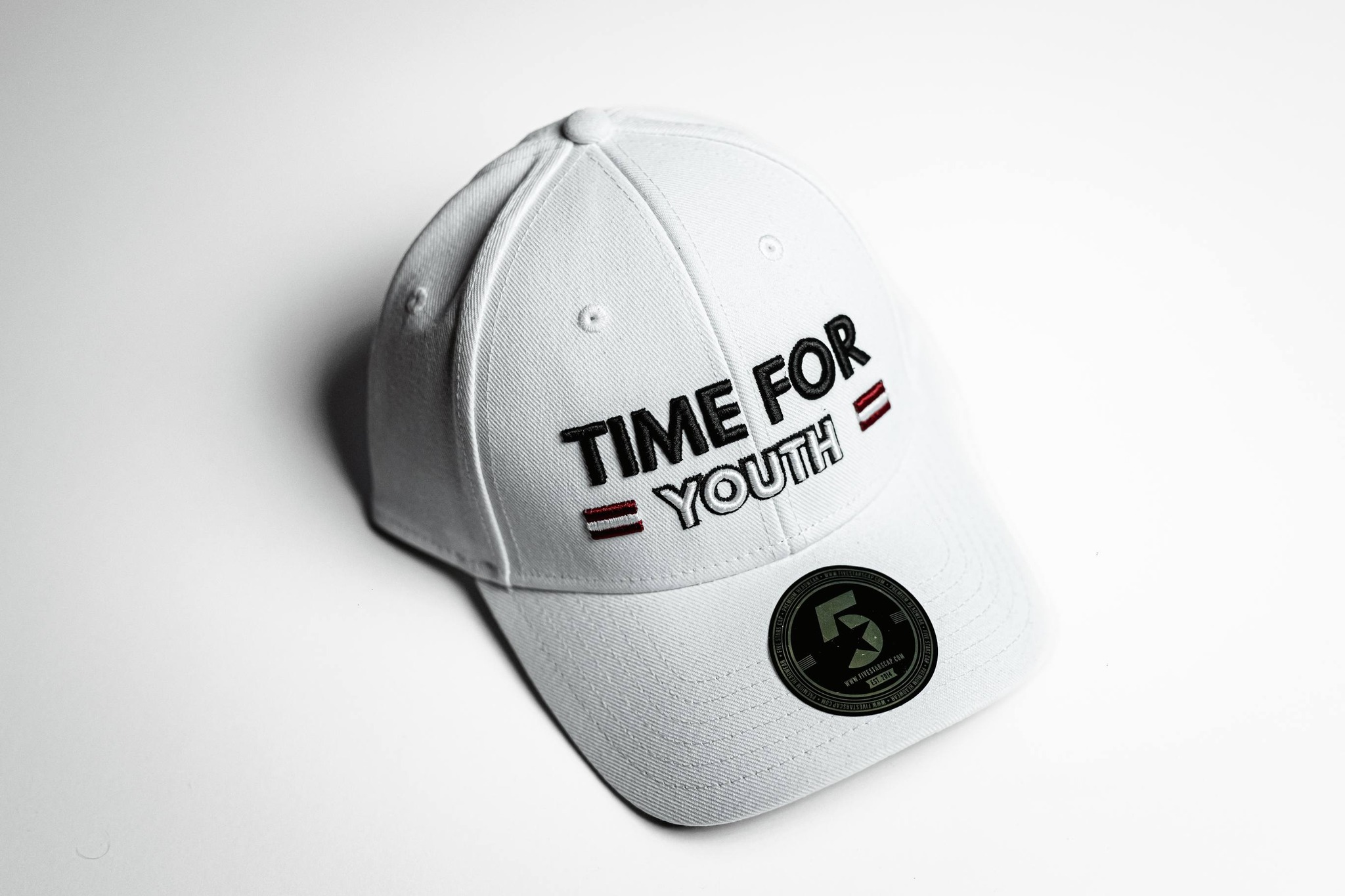 May be an image of hat and text