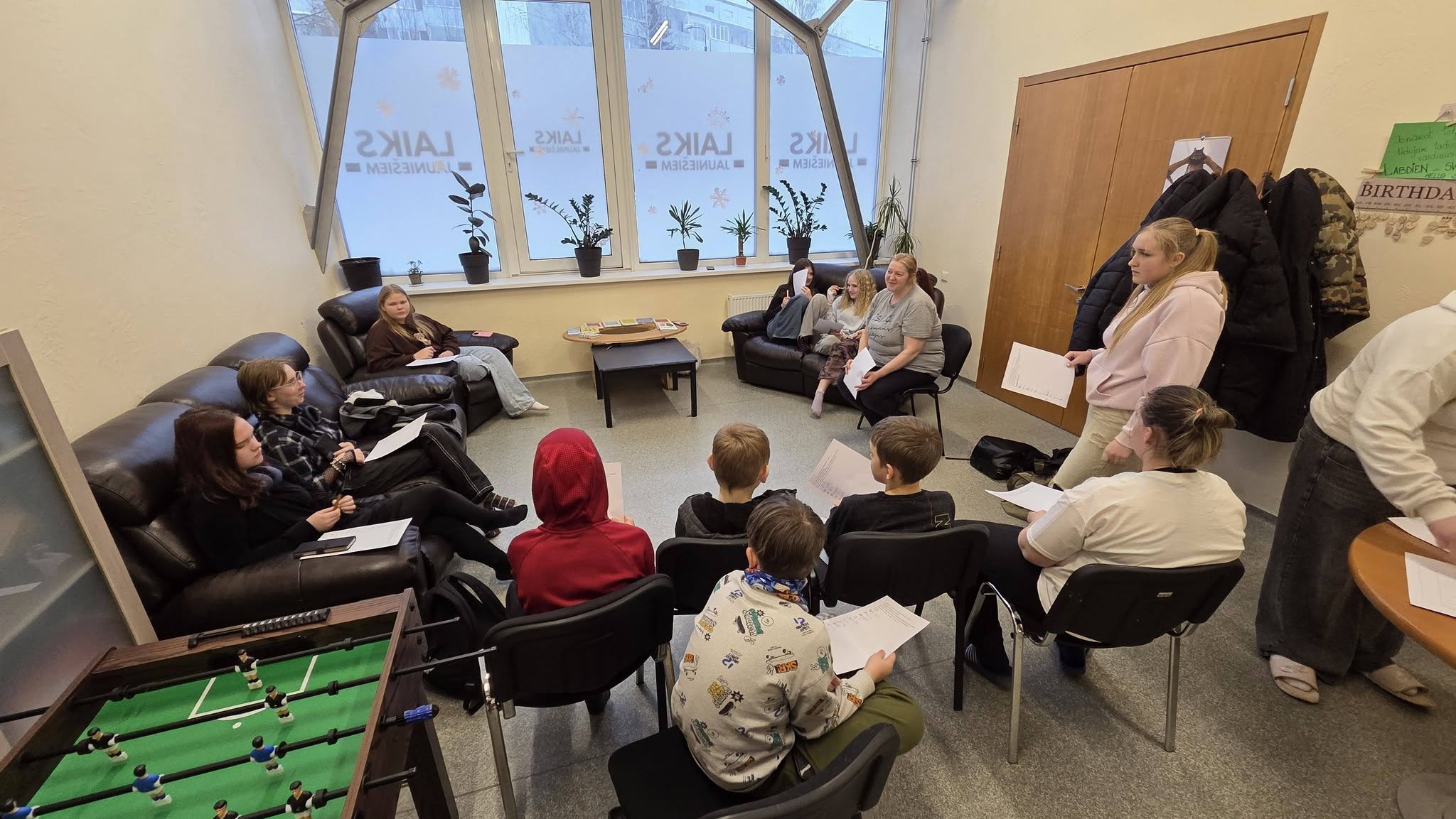 May be an image of studying, table and text