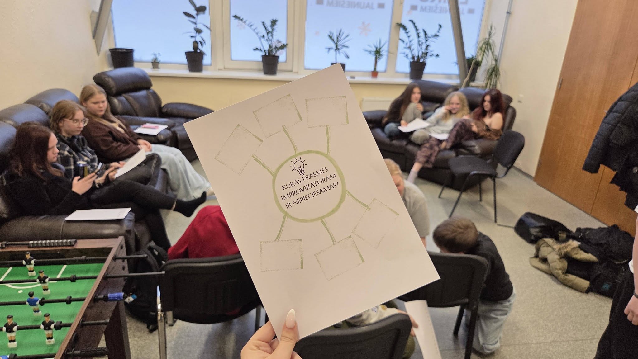 May be an image of studying, dartboard and text