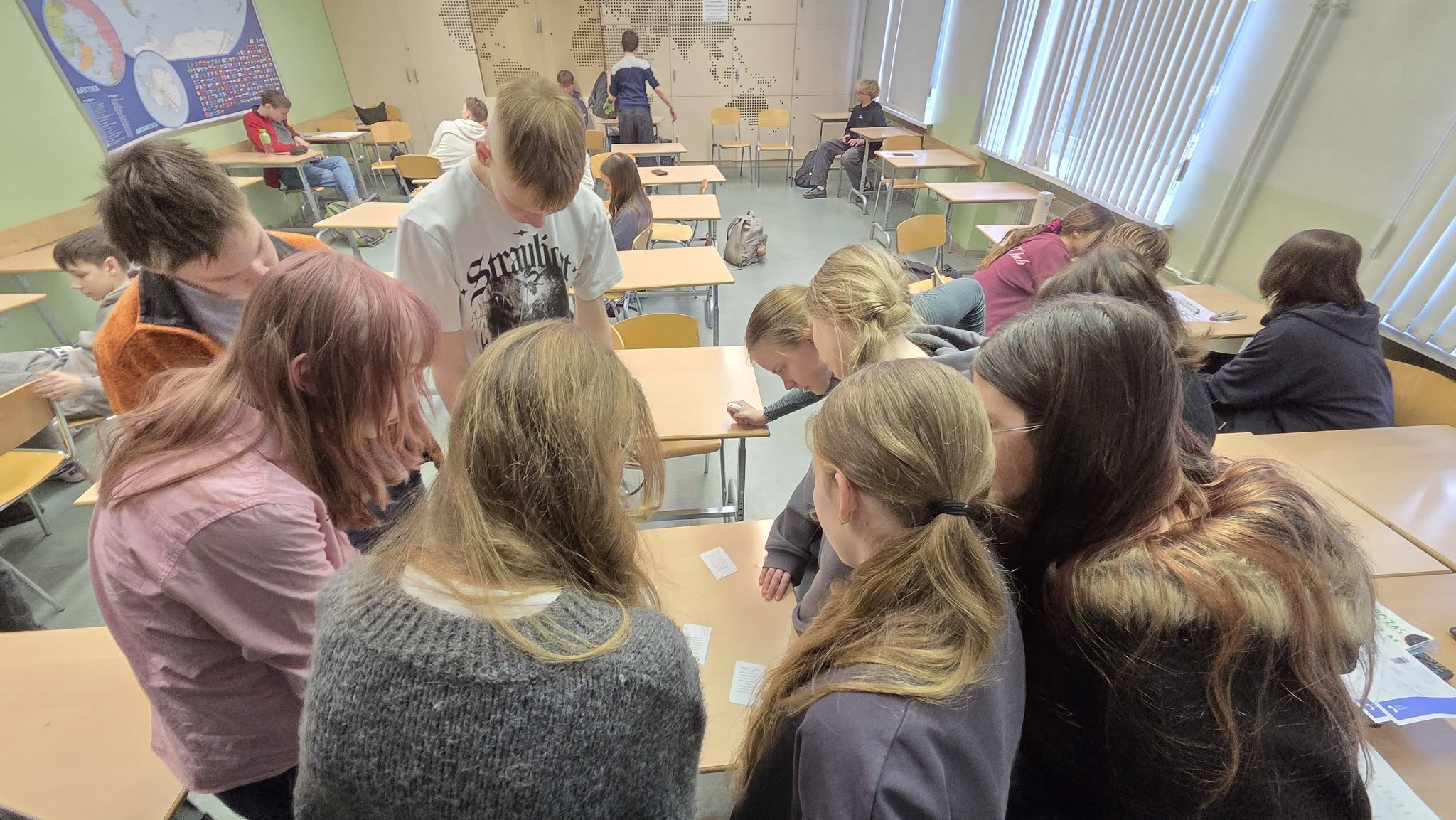 May be an image of studying and table