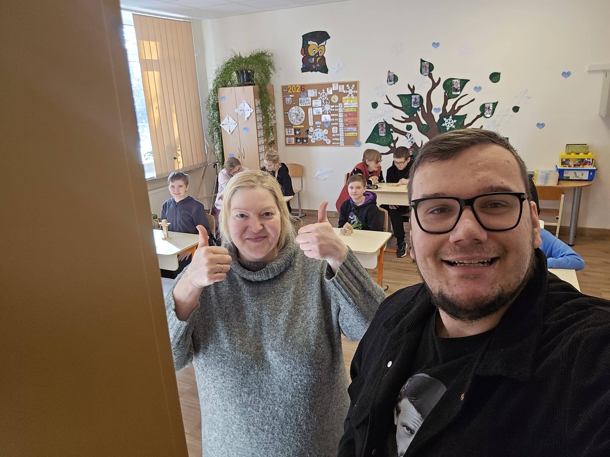 May be an image of one or more people, people smiling and eyeglasses