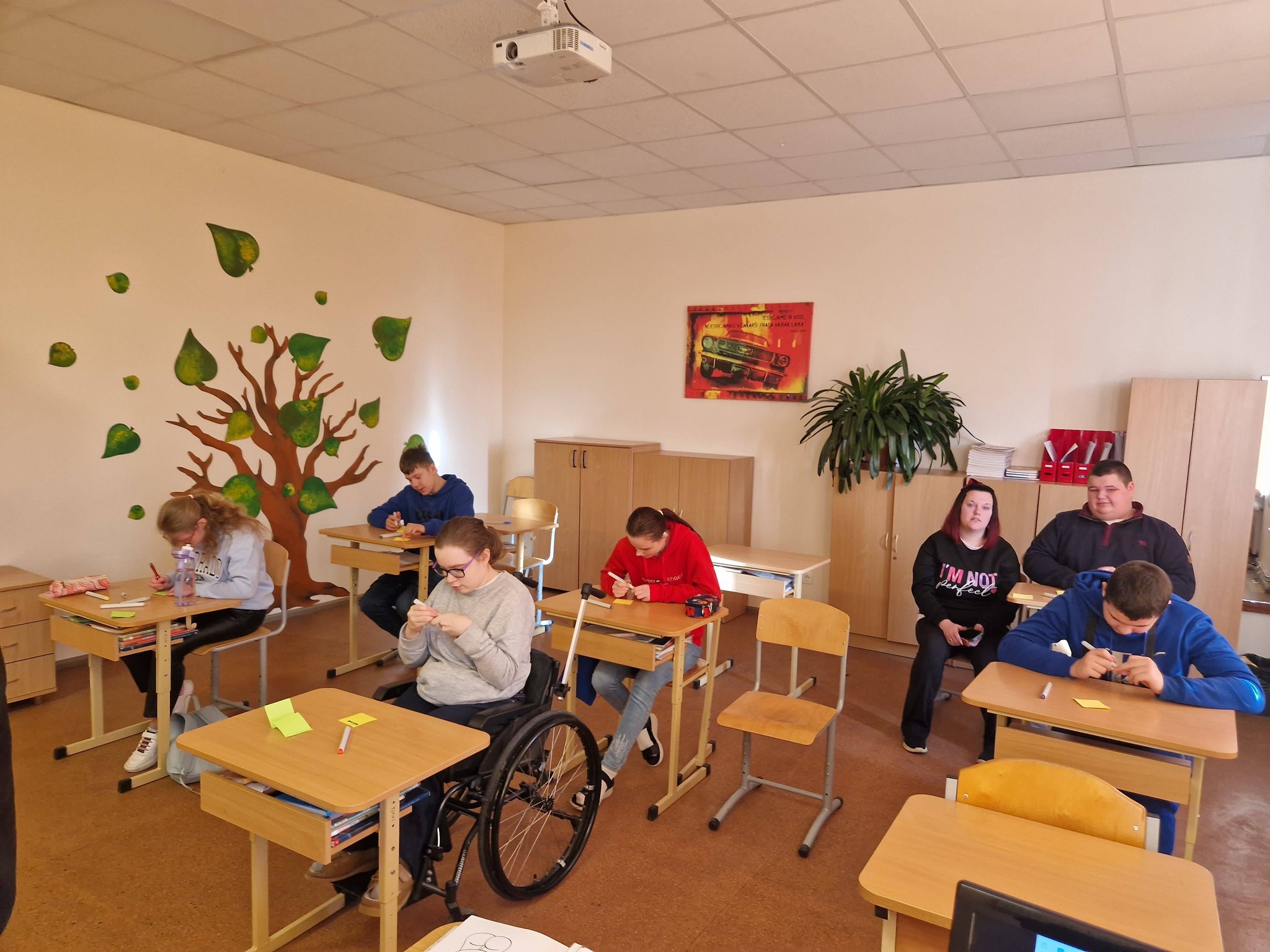 May be an image of studying, table and hospital